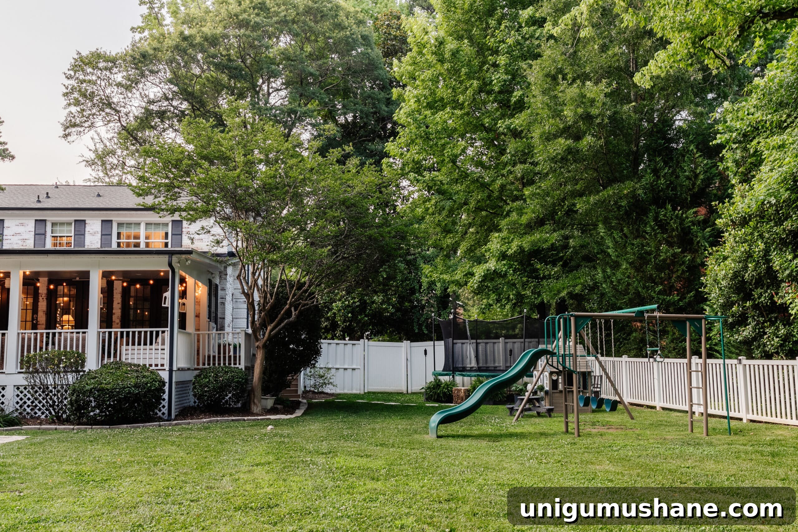 6 Small Side Porch Makeovers with Before and After Photos 17 side yard play area with playground and trampoline