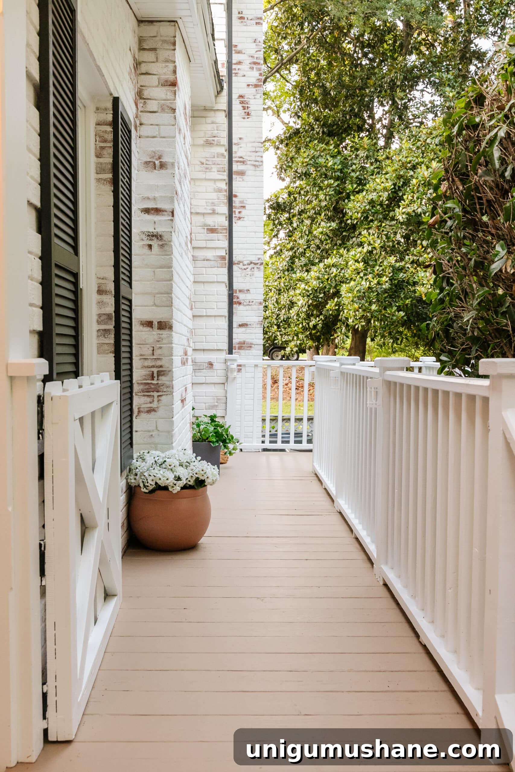 6 Small Side Porch Makeovers with Before and After Photos 3 small side porch makeover with planters
