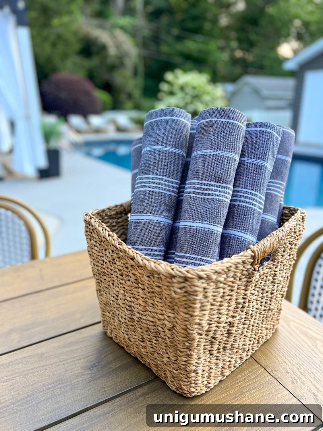 Swim Party Checklist: Backyard Tips for a Splashing Bash 21 backyard pool towels in a basket for guests to use