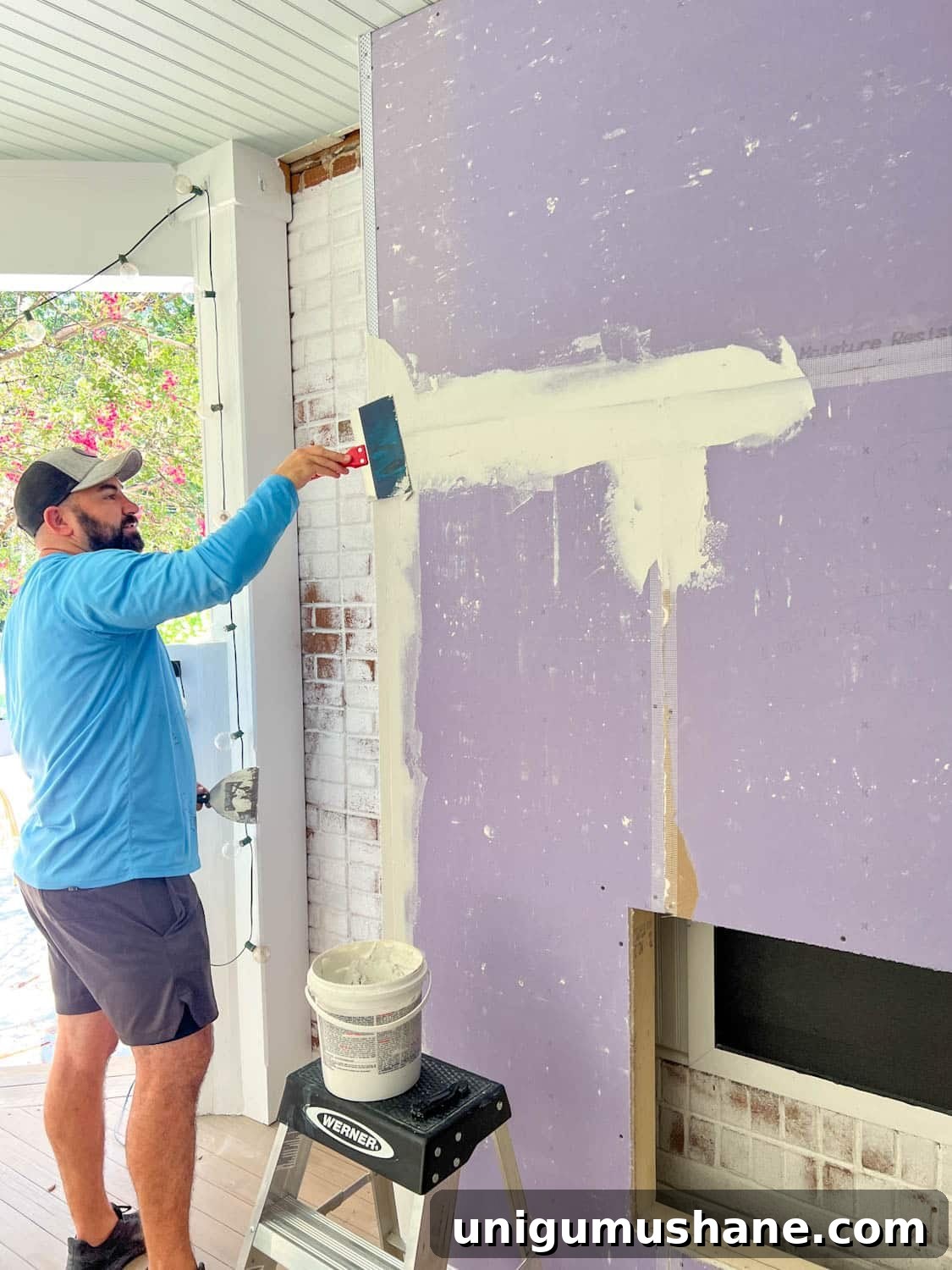 DIY Plaster Fireplace with Electric Insert Guide 16 applying joint compound to drywall seams