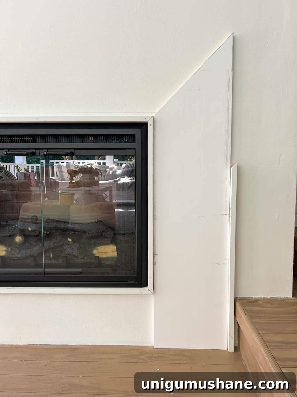 DIY Plaster Fireplace with Electric Insert Guide 25 building a DIY fireplace surround with 1x2 boards, 1x12 boards, and 1x4 boards