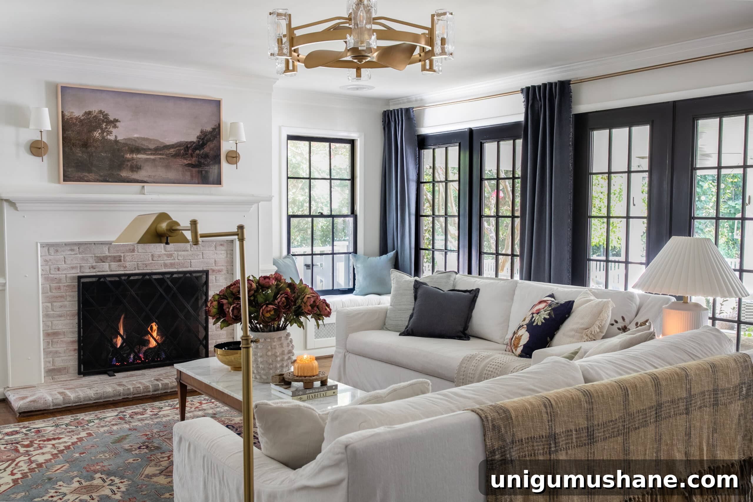 Start Decorating Your Living Room: A Step-by-Step Guide 14 white living room with black windows blue curtains white sofas and fall decor