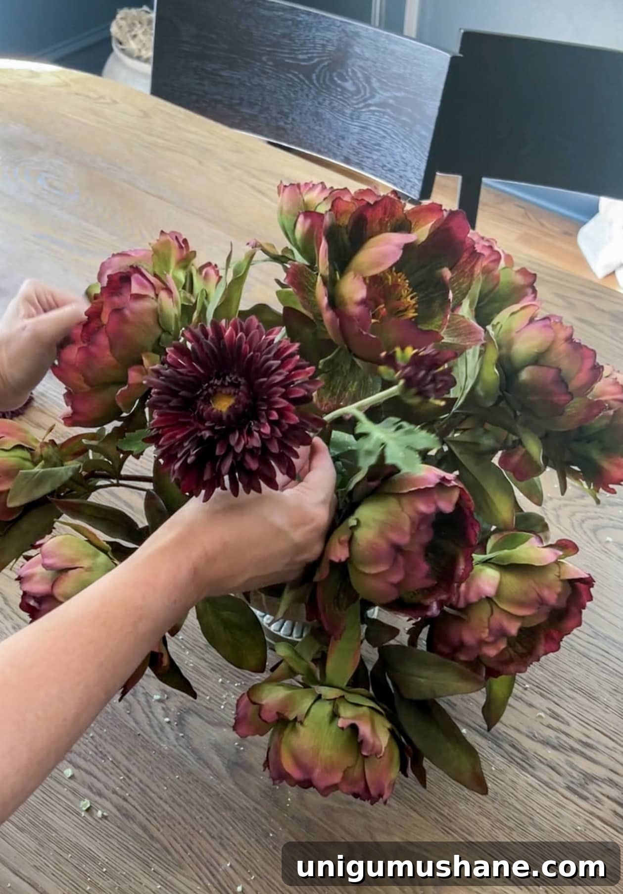 DIY Fall Floral Arrangement: Step-by-Step Guide 10 filling in a fall flower arrangement with burgundy mums