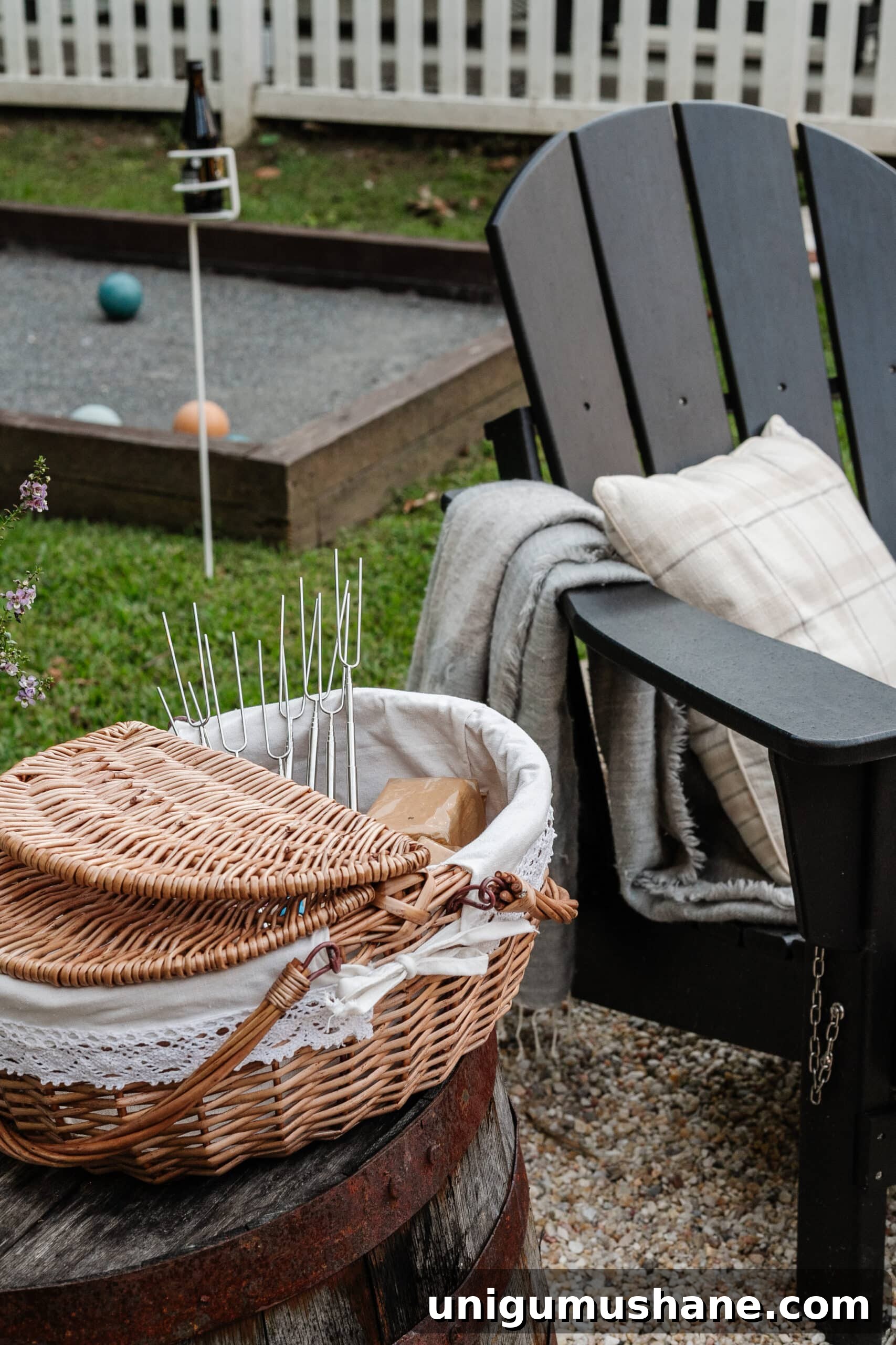 How to Host a Memorable Bonfire Party: 10 Safety and Setup Tips 9 s'mores station setup in a picnic basket with ingredients and skewers