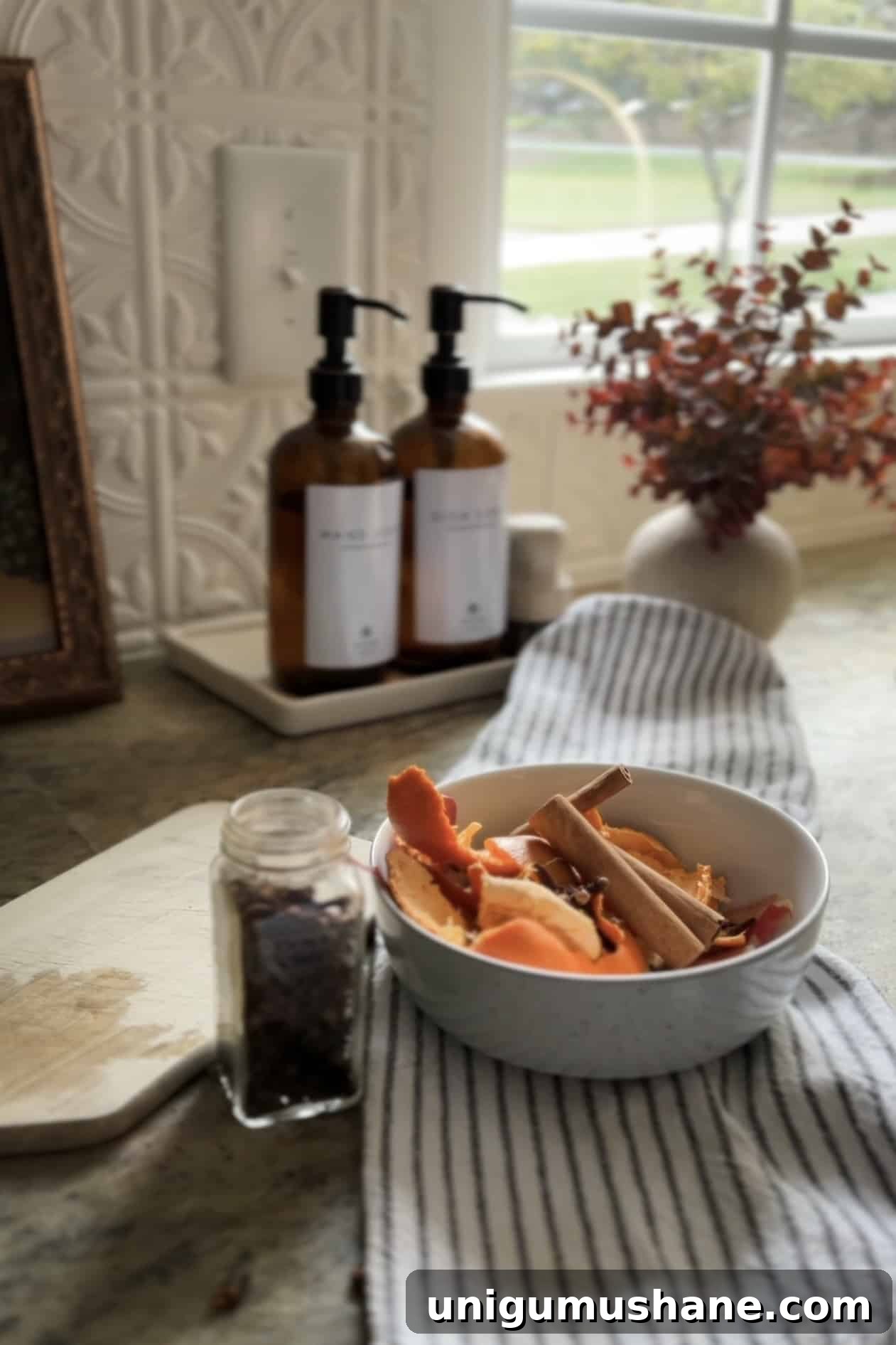 Zero-Waste Simmer Pot Recipe with Kitchen Scraps 2 orange and apple scraps to make no waste stovetop potpourri
