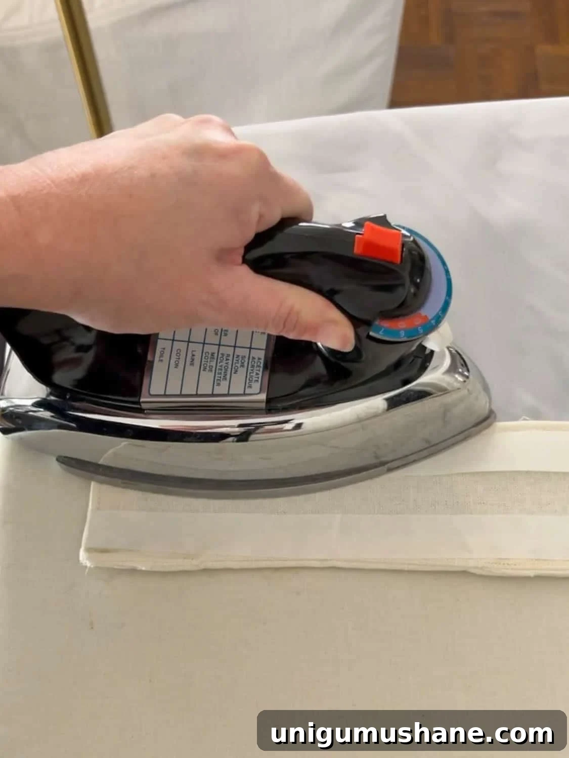 How to Make No-Sew Curtains with Trim 9 ironing hemming tape on a curtain