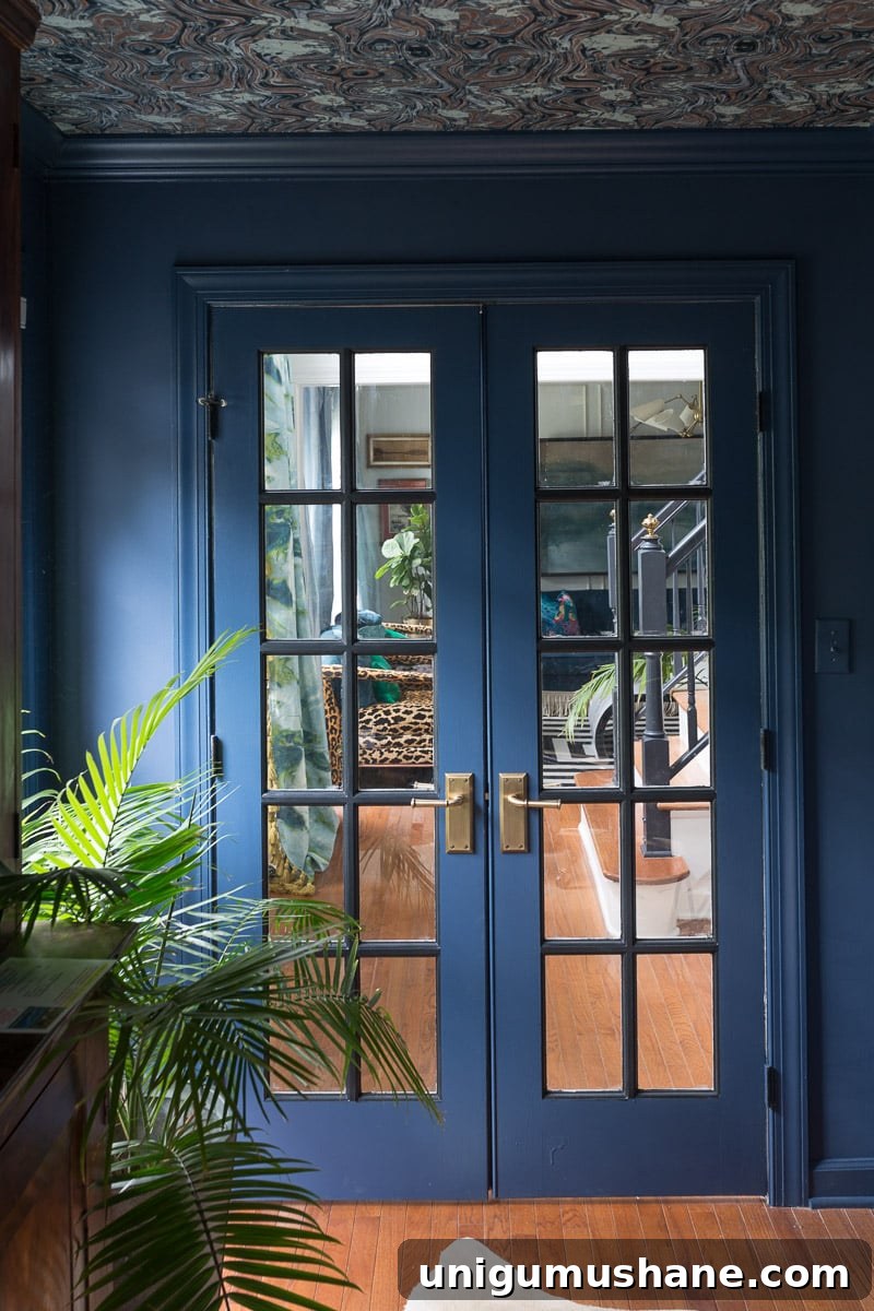 Media Room Storage Ideas for Your Next Makeover 9 blue monochromatic french doors, trim, and walls with wallpapered ceiling