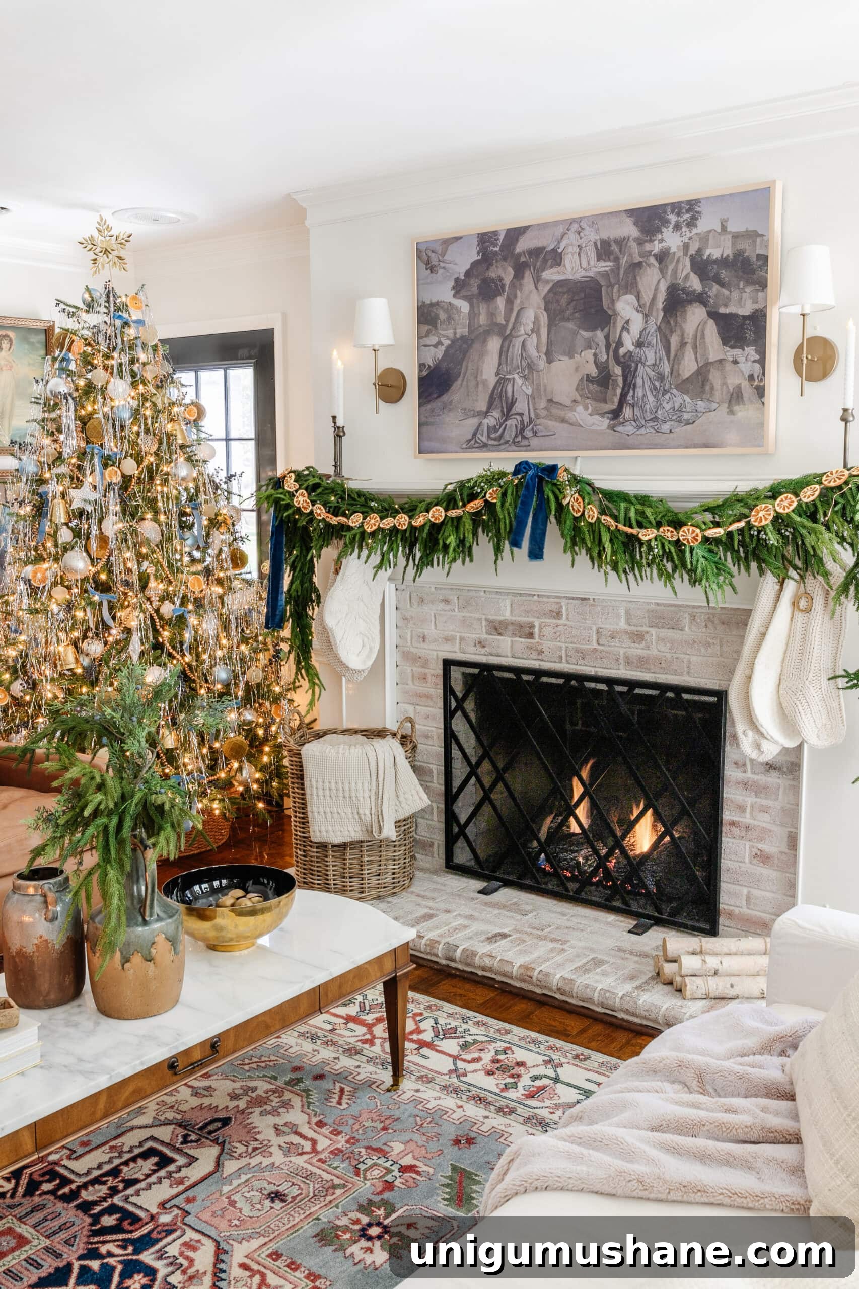 DIY Christmas Mantel Garland Ideas to Transform Your Fireplace 10 Christmas fireplace decorated with pine garland, blue velvet ribbon, juniper sprigs, and orange slices