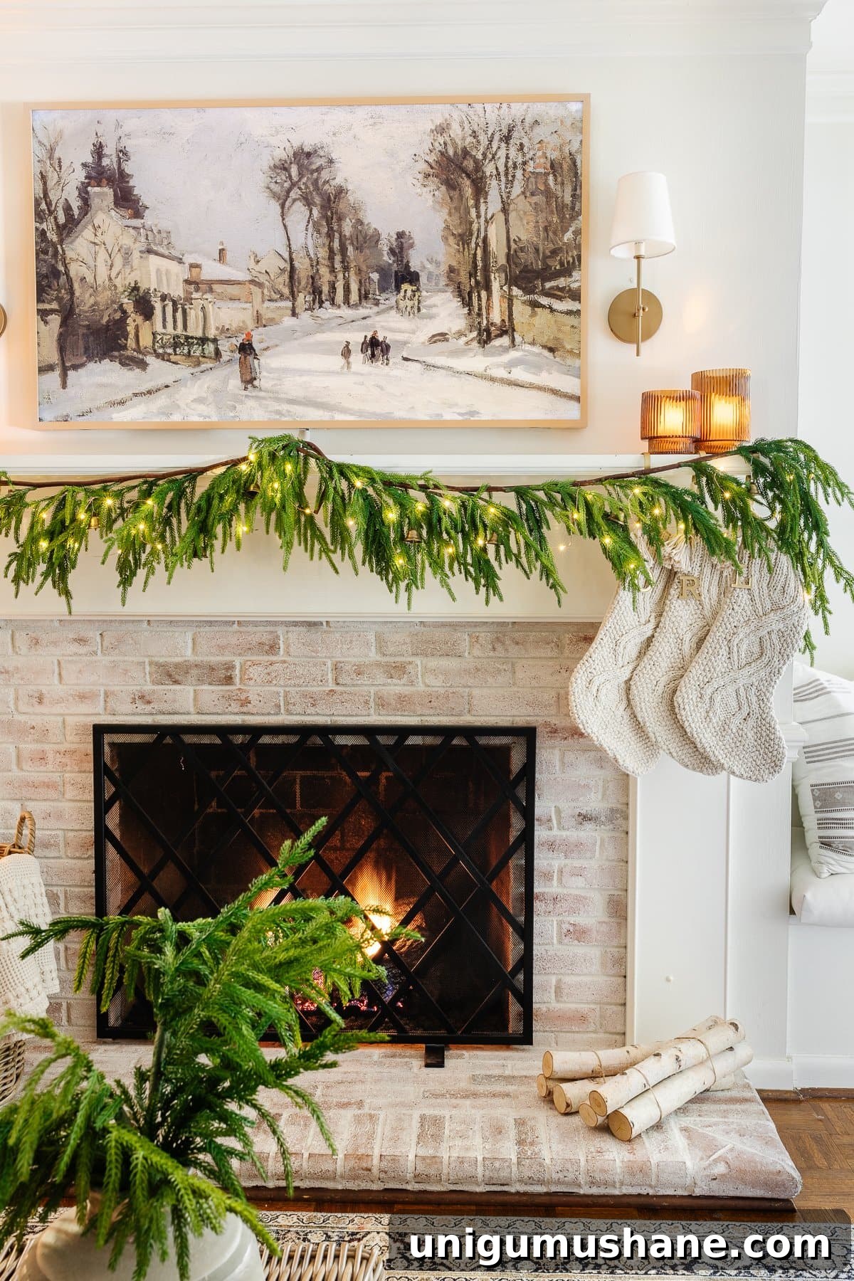 DIY Christmas Mantel Garland Ideas to Transform Your Fireplace 9 simple minimalist Christmas mantel with pine and fairy lights