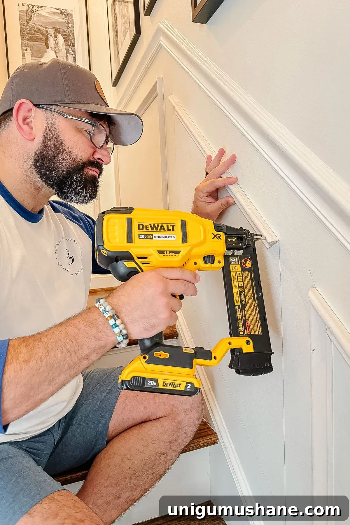 nailing molding cut at an angle on stairs