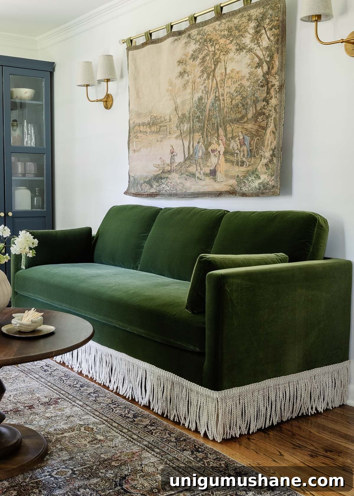 Transform Sofas and Chairs with DIY Fringe Trim 6 green velvet fringe sofa in an office