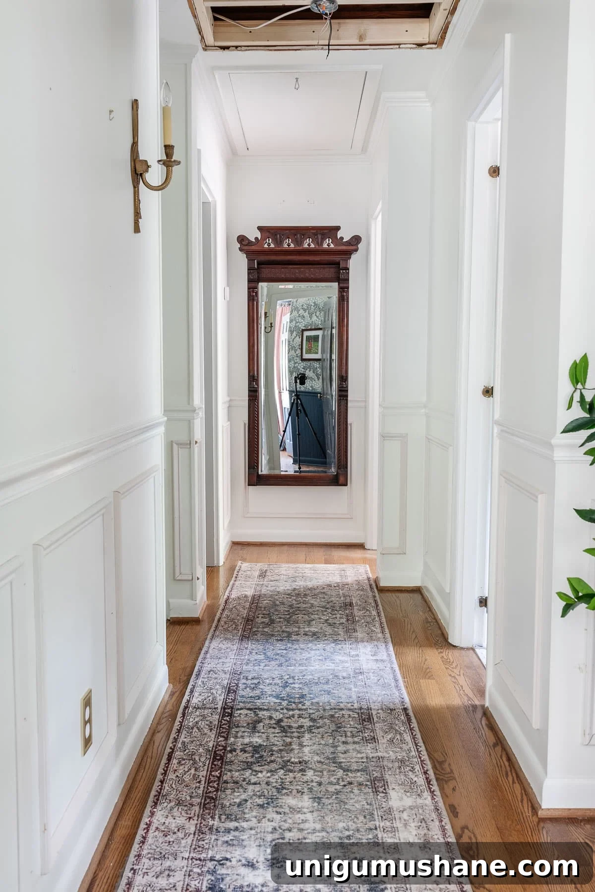 8 Genius Ways to Cover Popcorn Ceilings Without Removing Them 11 patching a ceiling in a hallway