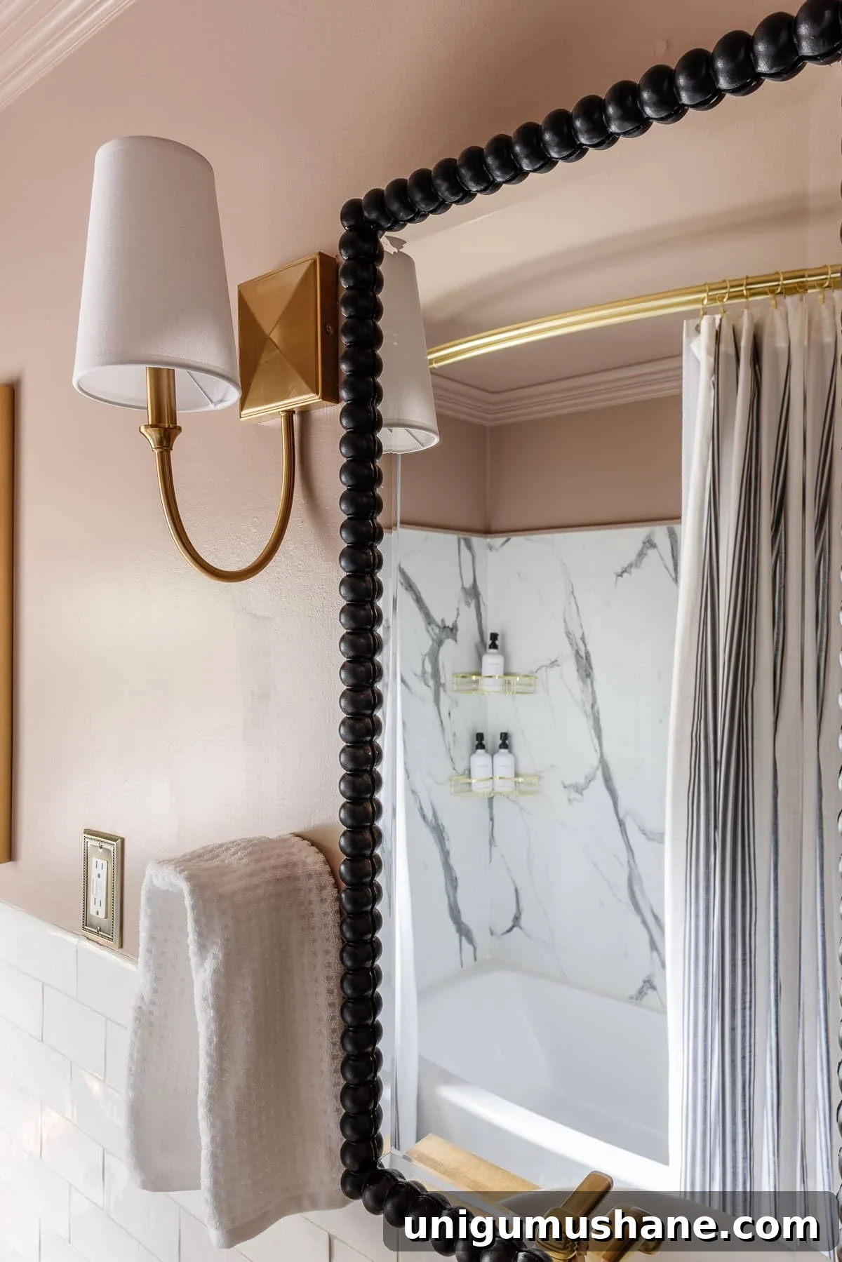 4-Day Black and Pink Bathroom Makeover: Before and After 11 pink bathroom walls with black beaded mirrors and gold sconces
