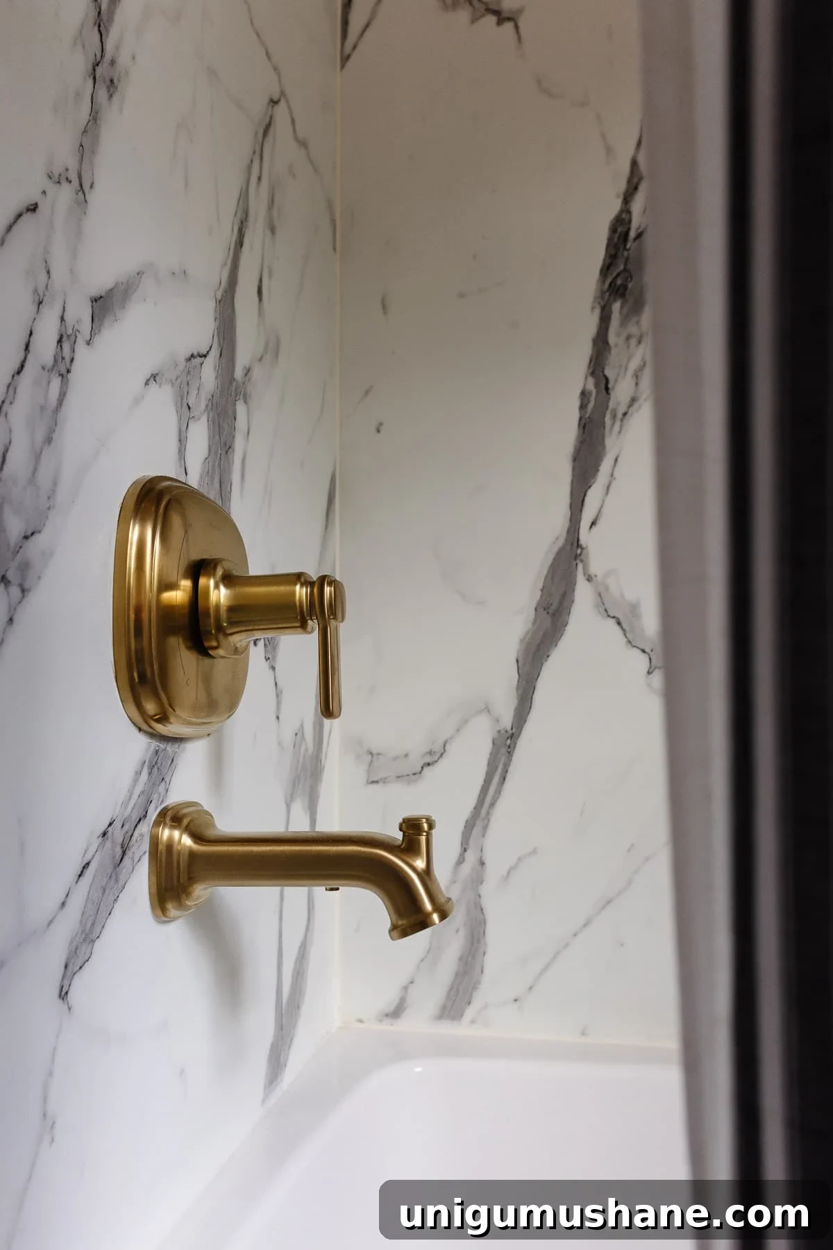 4-Day Black and Pink Bathroom Makeover: Before and After 9 faux marble shower surround with gold tub faucet