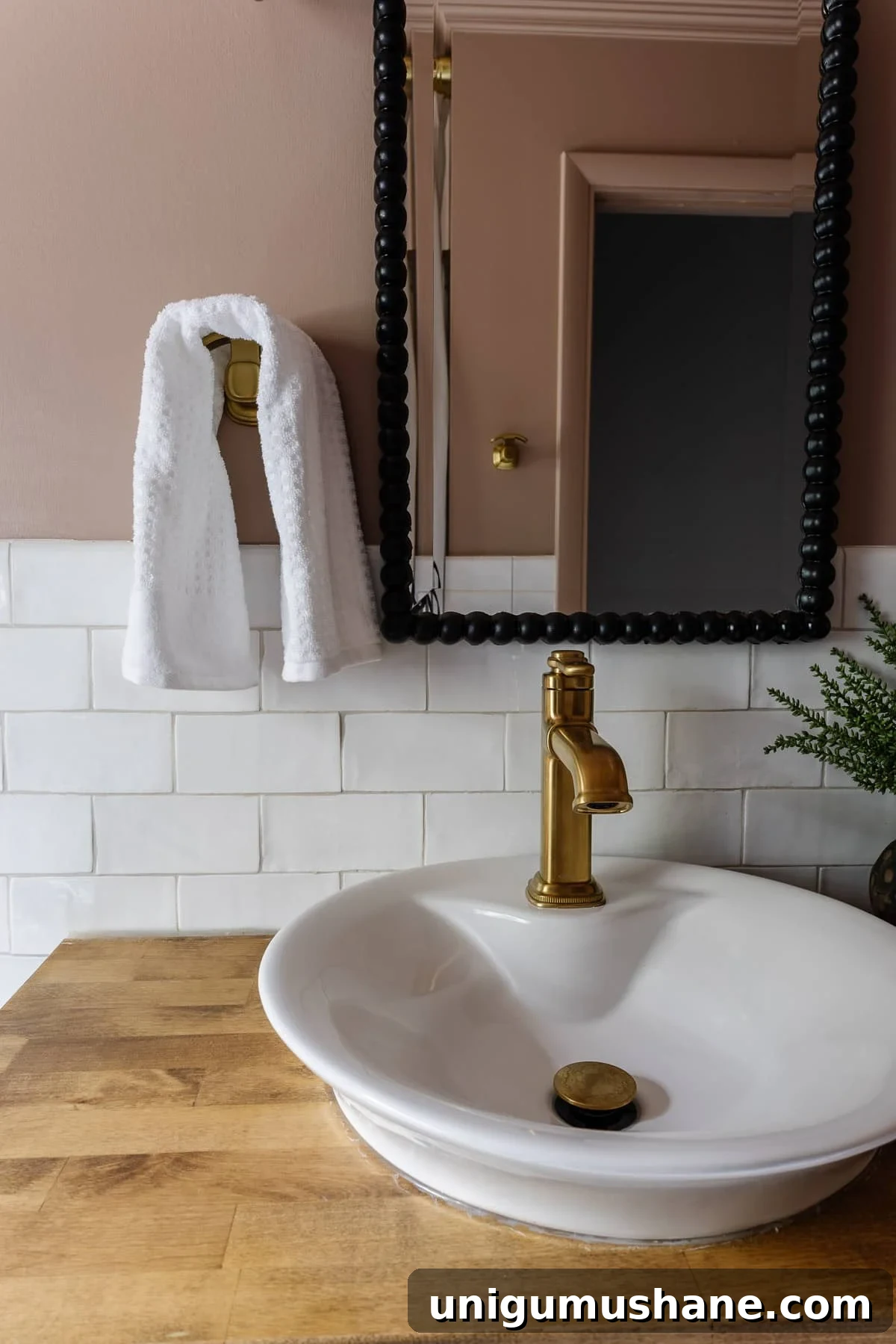 4-Day Black and Pink Bathroom Makeover: Before and After 10 Behr Postmodern Mauve pink bathroom with subway tile and black beaded mirror