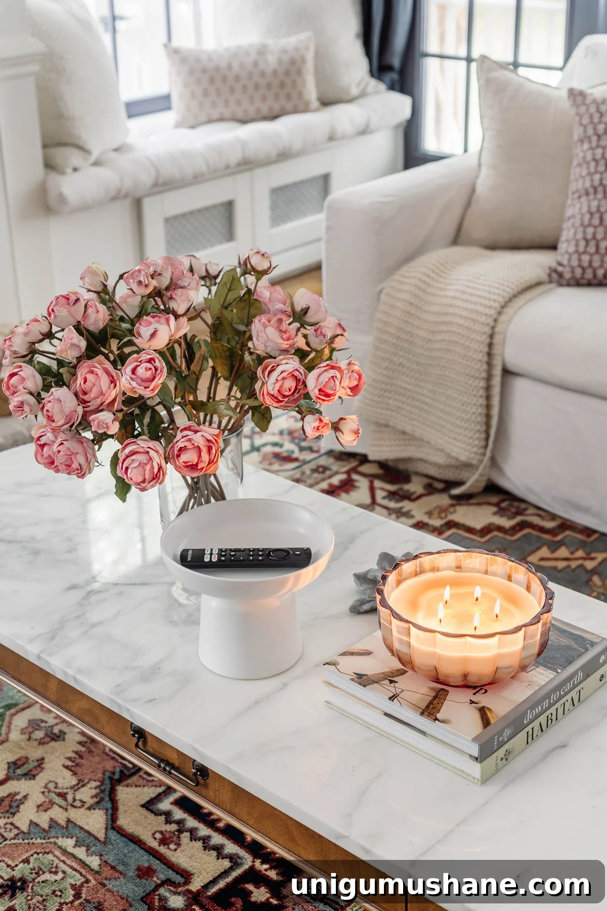 8 Reasons a Pedestal Bowl Belongs in Your Home Decor 3 pedestal bowl used as a remote control holder on a coffee table