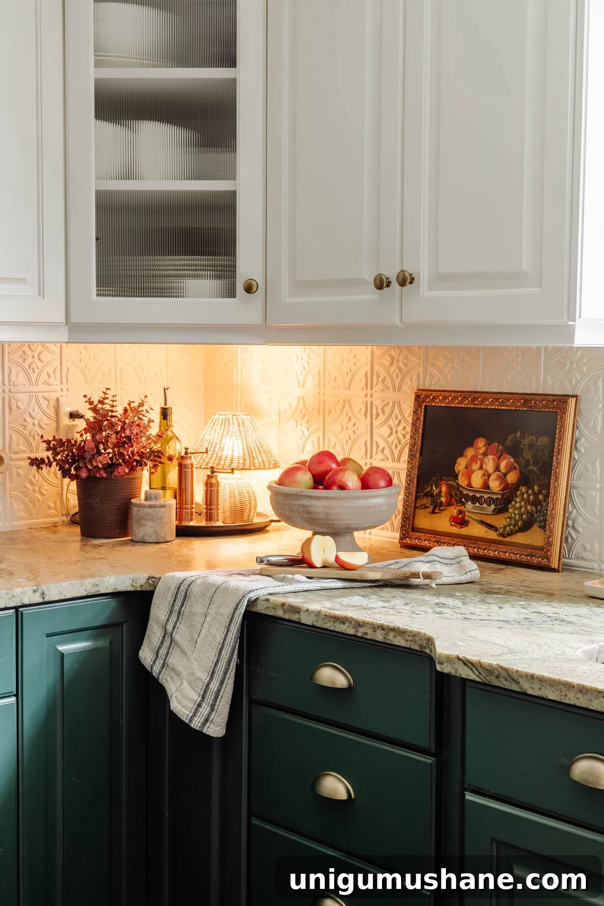 8 Reasons a Pedestal Bowl Belongs in Your Home Decor 5 footed bowl used as a fruit bowl on a kitchen countertop