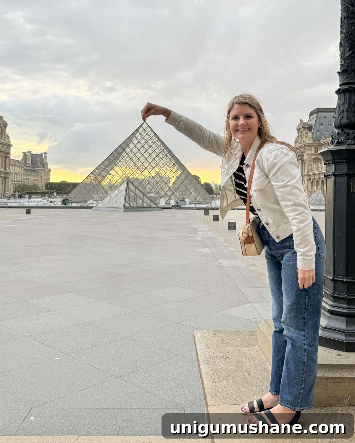 Weight Loss Journey: My Health Transformation Story 10 woman in front of the Louvre pyramid