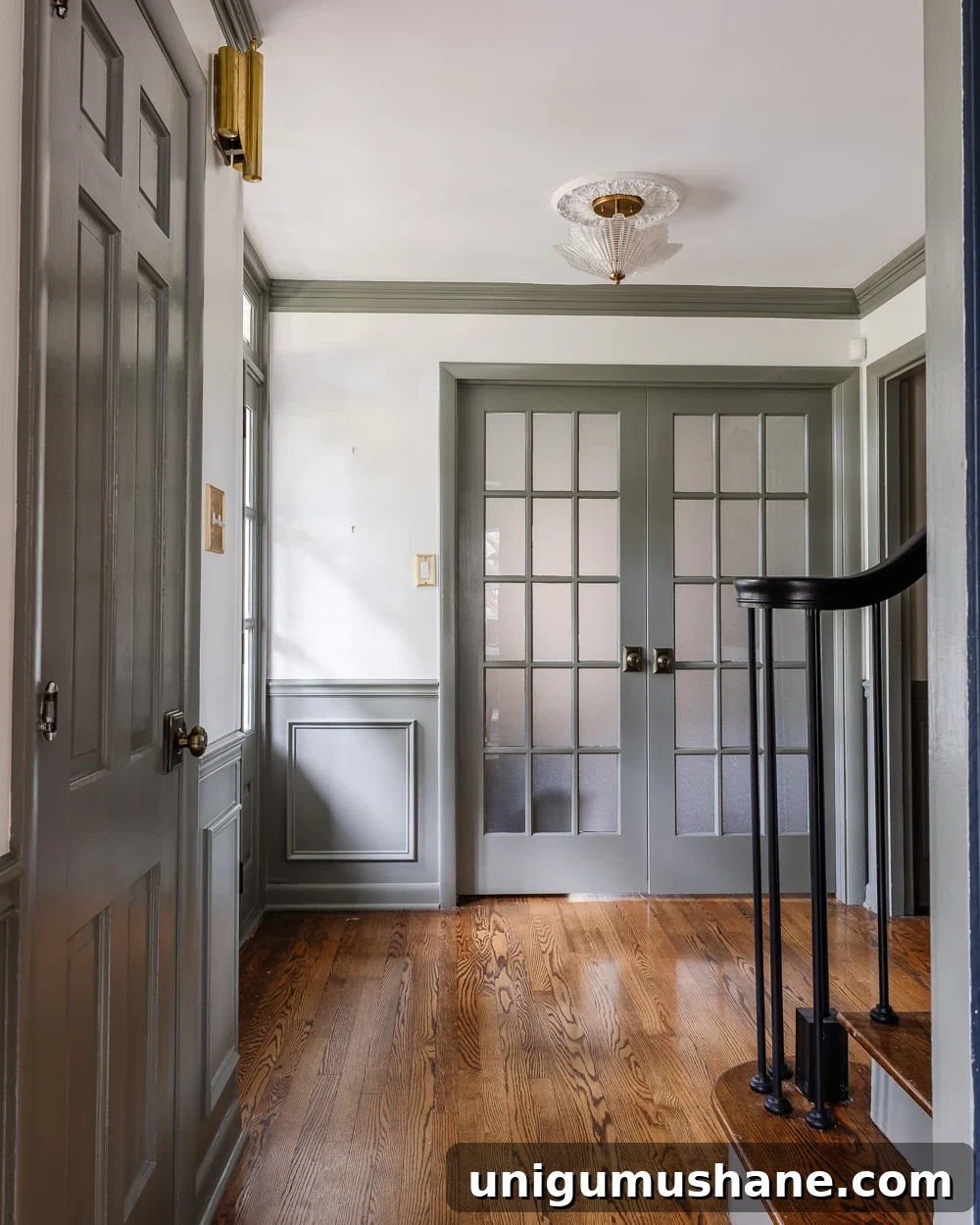 The Perfect Green Gray Paint Color for Your Home 4 green gray paint color in a front entryway foyer
