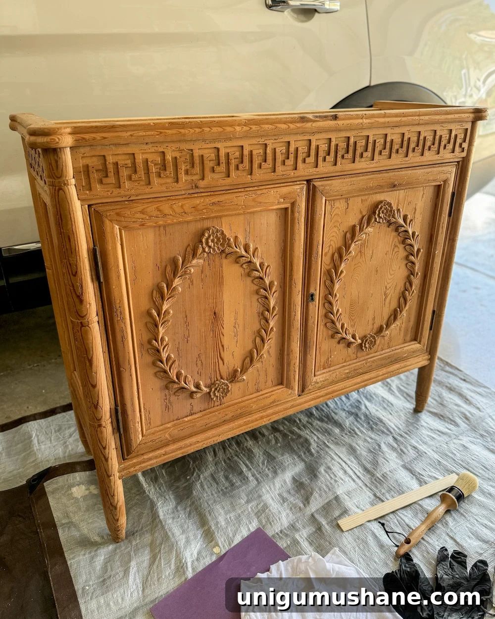 orange wood cabinet before applying gel stain