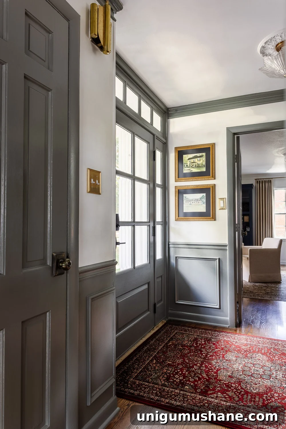 Stylish Entryway and Foyer Makeover Ideas Under $300 5 front door painted green gray in a foyer with unexpected red theory in a rug
