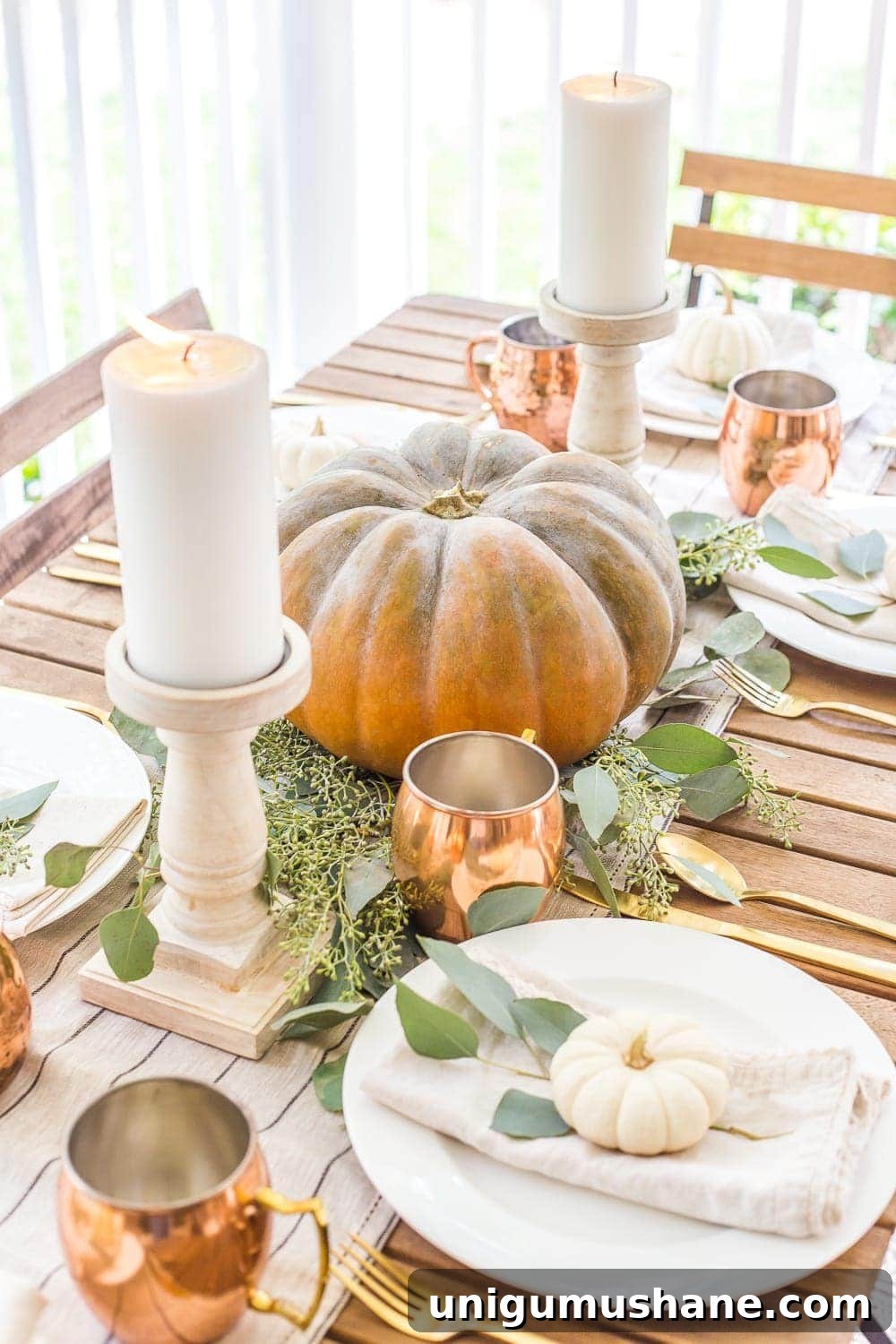 14 Natural Home Decor Ideas to Bring the Outdoors In 16 pumpkin centerpiece for fall table decor