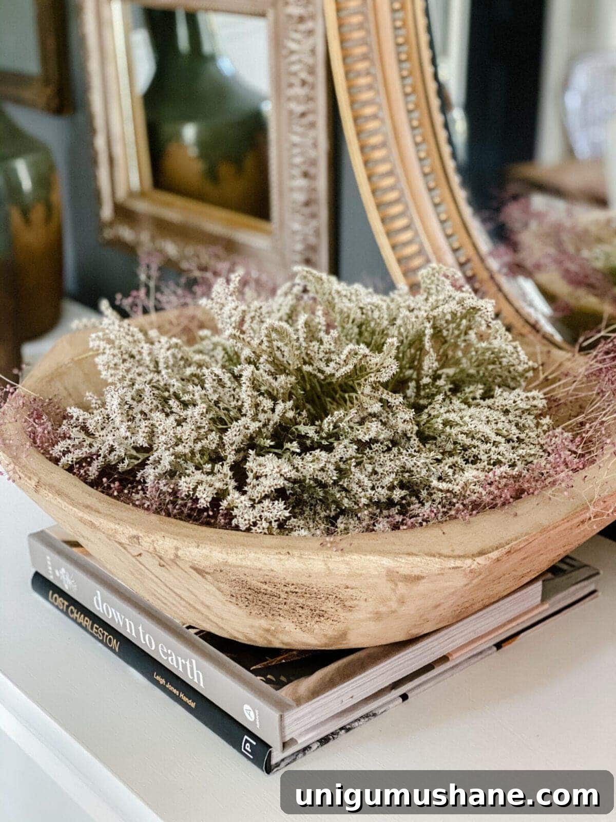 14 Natural Home Decor Ideas to Bring the Outdoors In 18 wooden bowl of dried flowers for natural decor display