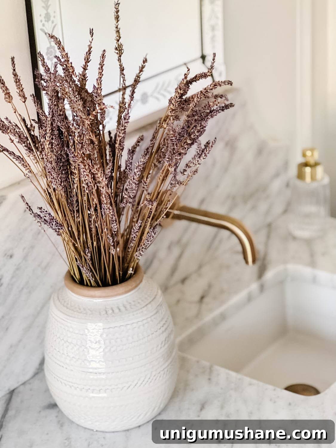 14 Natural Home Decor Ideas to Bring the Outdoors In 10 vase of dried lavender in a bathroom