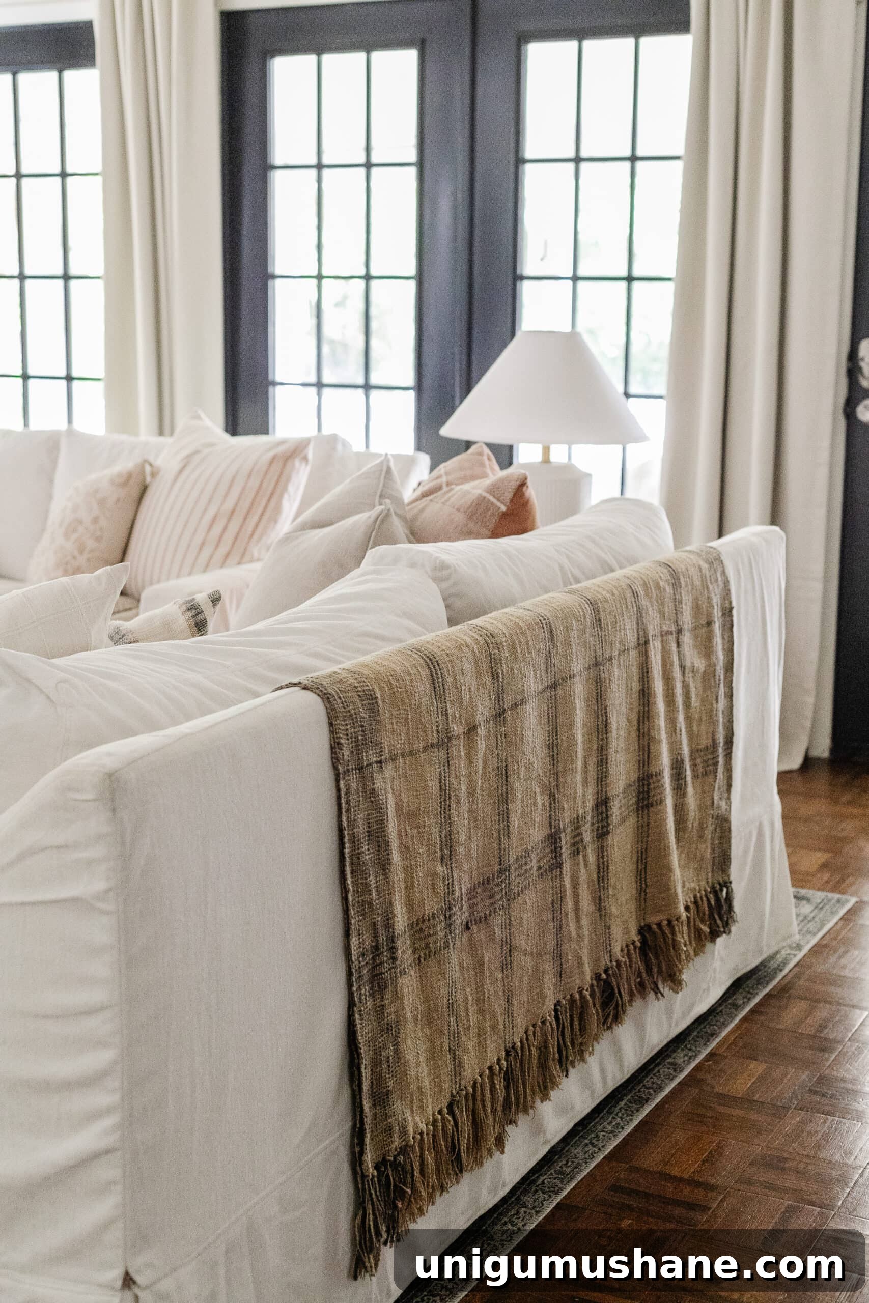 13 Upcycled Fabric DIY Projects for Home Decor 12 throw blanket to cover a sofa back