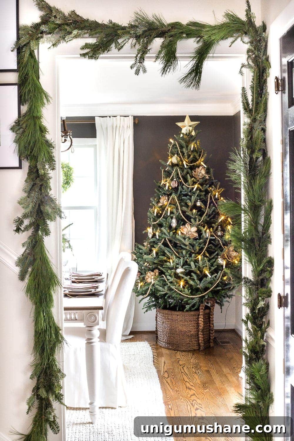 18 Natural DIY Christmas Decor Ideas to Make at Home 14 real christmas garland around door frame with real christmas tree