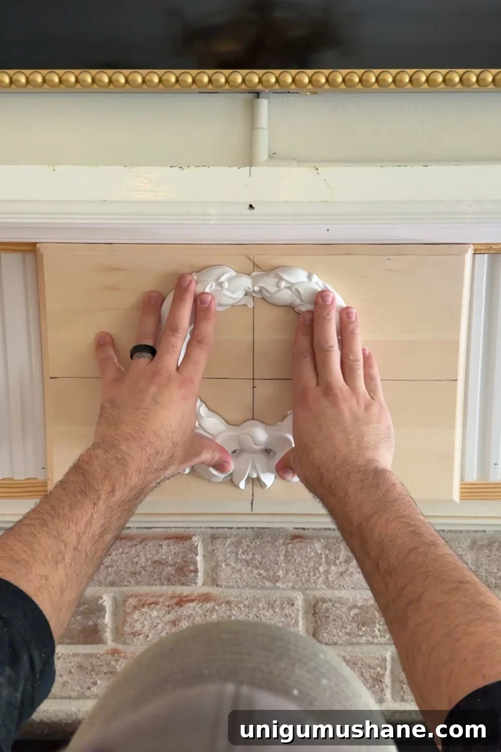 attaching wreath overlay with construction adhesive
