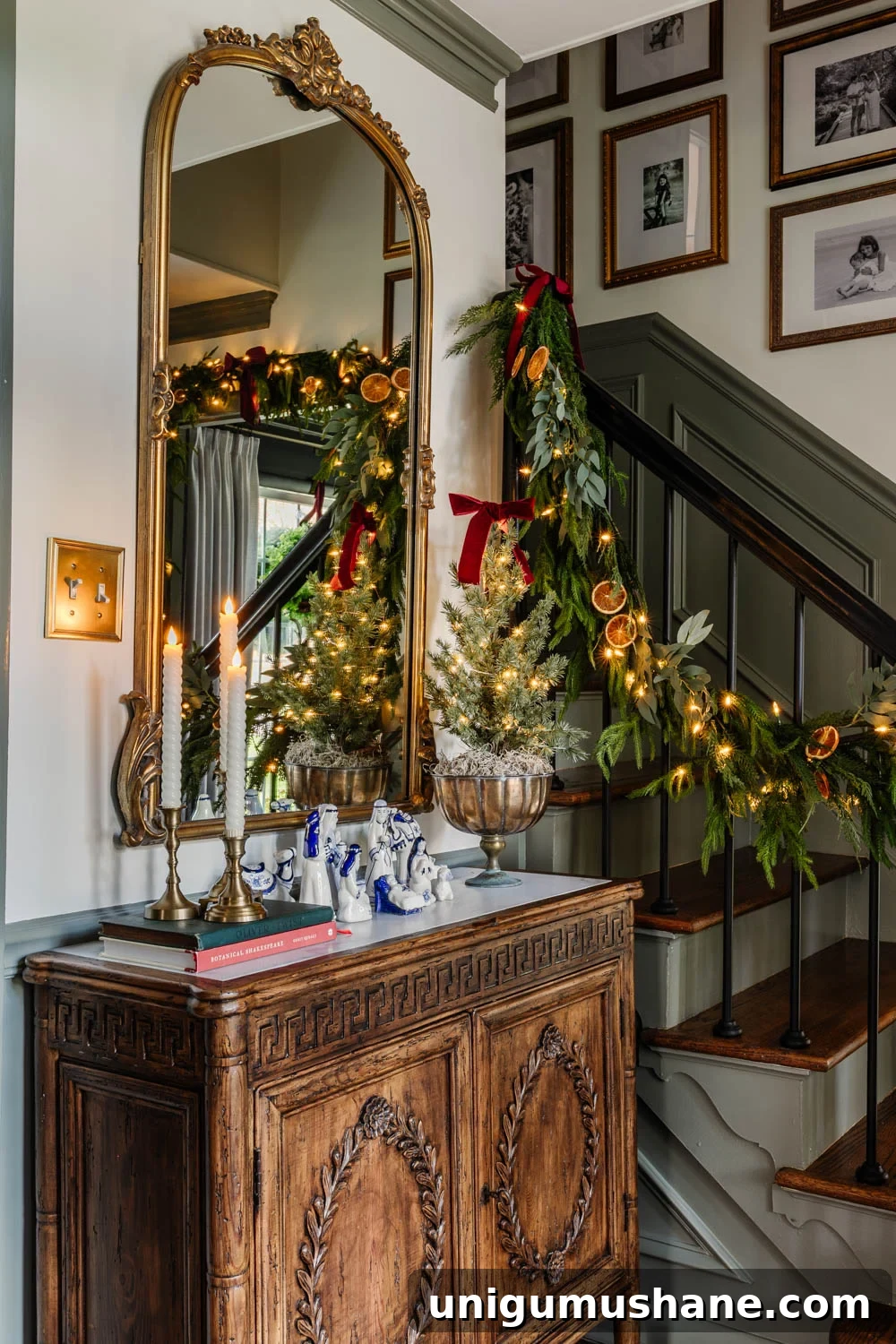 Colonial-Inspired Christmas Entryway Decorating Ideas 4 entryway cabinet with blue and white nativity set and candles decorated for Christmas