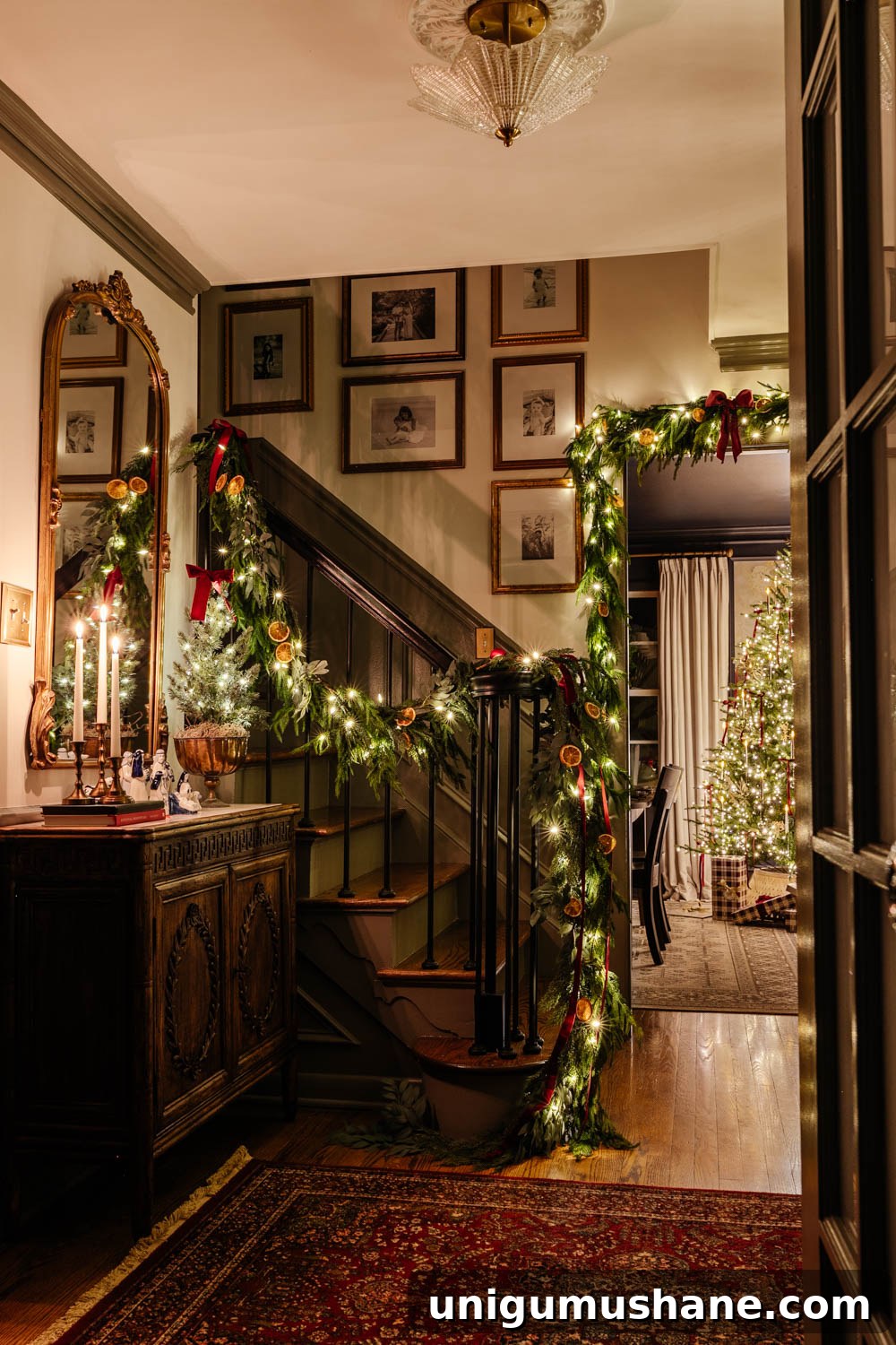 traditional candlelight Christmas night tour in entryway with nativity