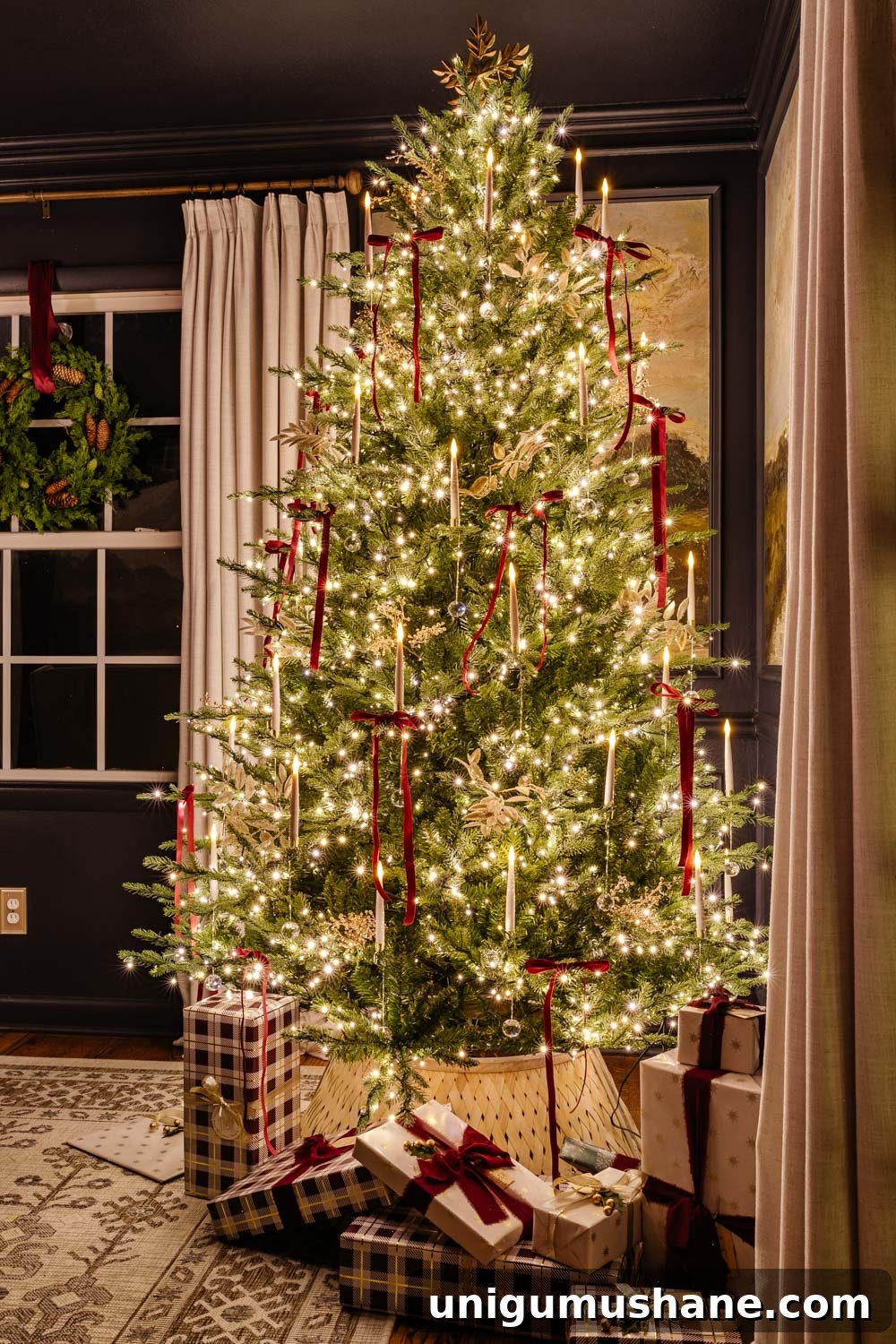 dining room Christmas tree at night in candlelight