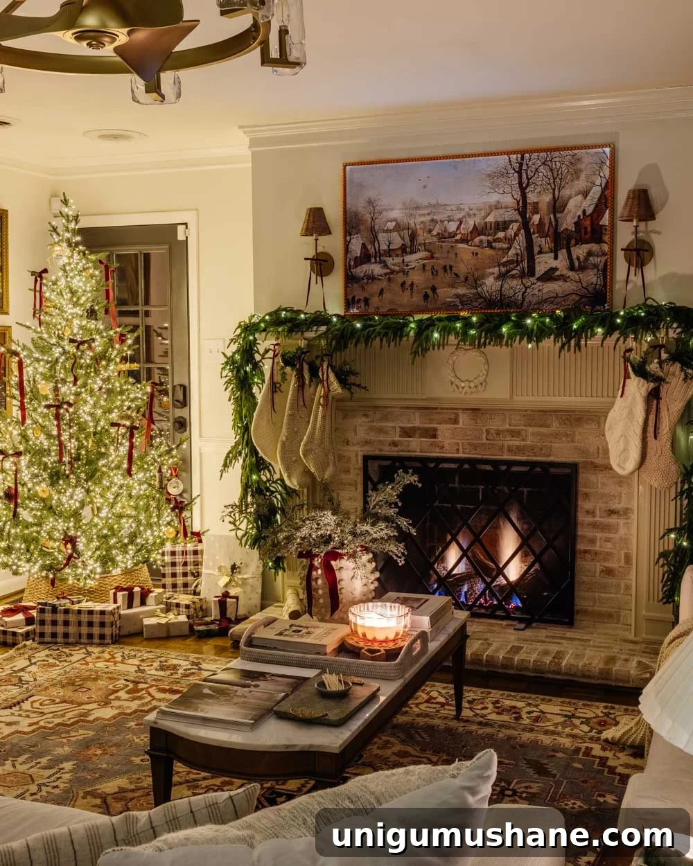 candlelight Christmas tour in living room with tree and traditional fireplace