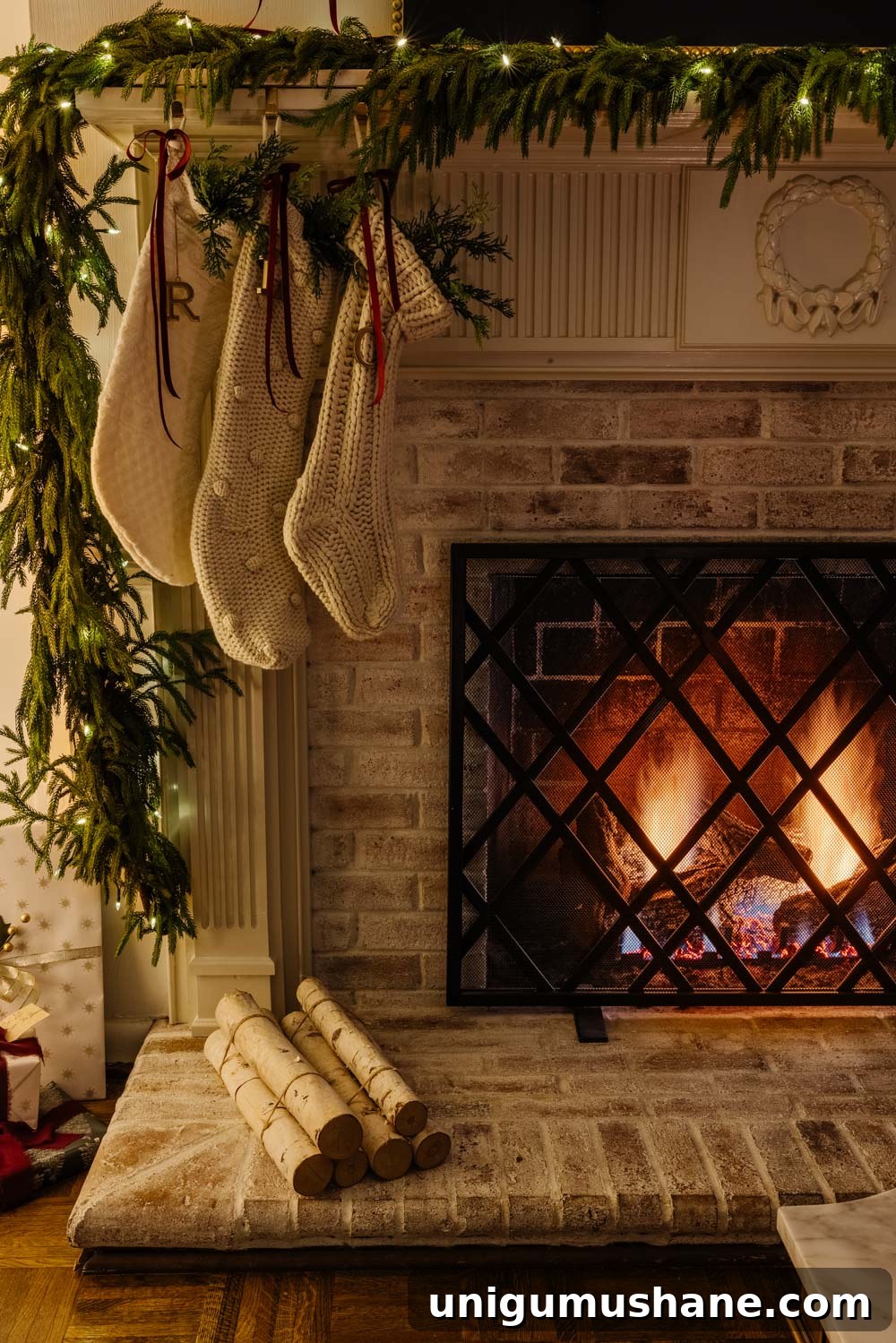 candlelight Christmas tour in living room with tree and traditional fireplace