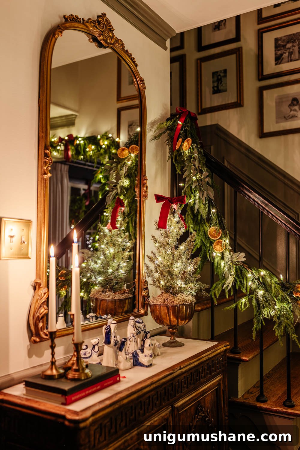 traditional candlelight Christmas night tour in entryway with nativity