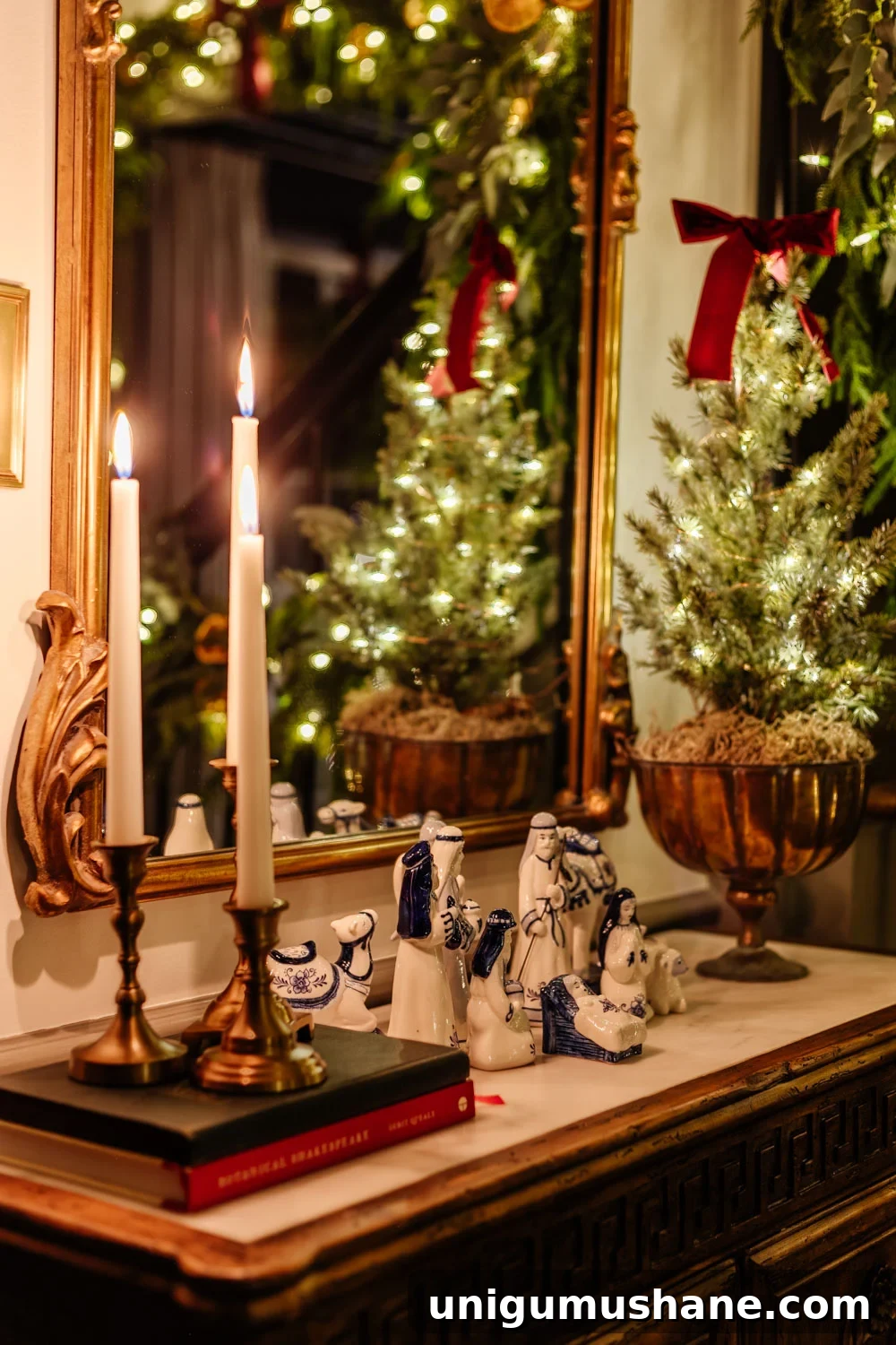 candlelight Christmas entryway table with nativity