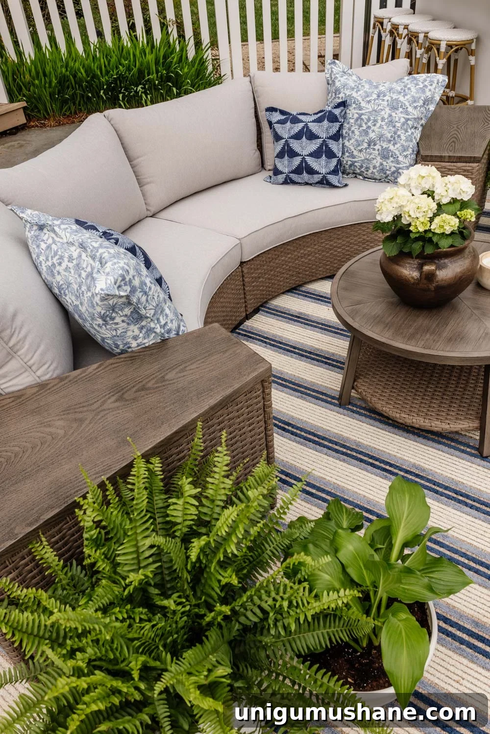 Outdoor Furniture Roundup: Save on Stylish Patio Picks 3 curved outdoor furniture with storage tables