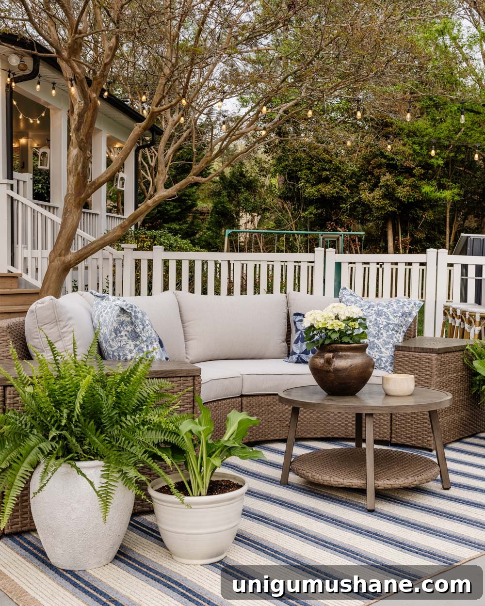 Outdoor Furniture Roundup: Save on Stylish Patio Picks 6 curved outdoor furniture set with blue striped patio rug