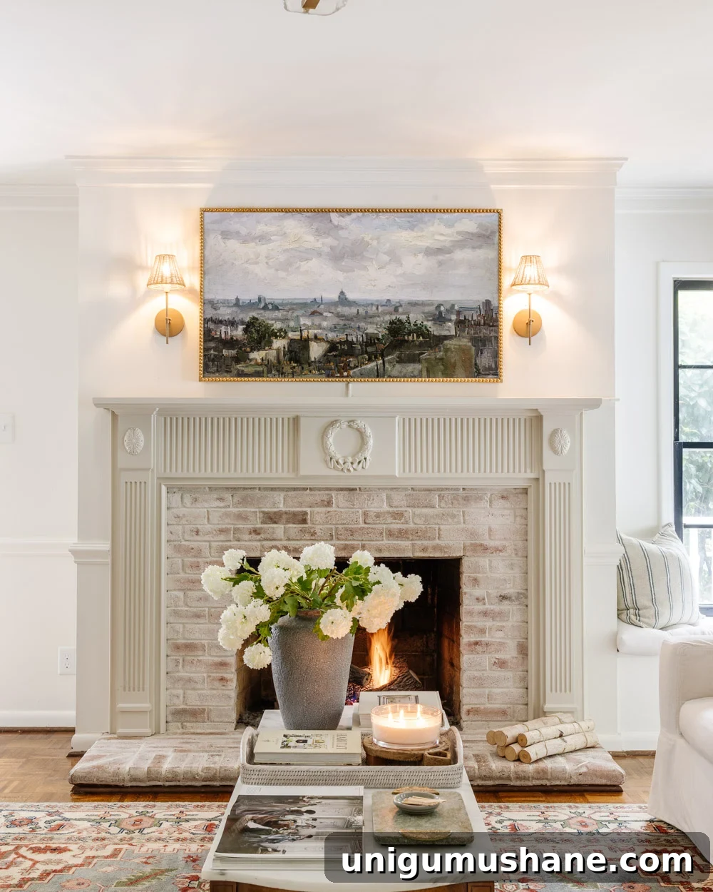 fireplace with ornate molding and spring coffee table decor