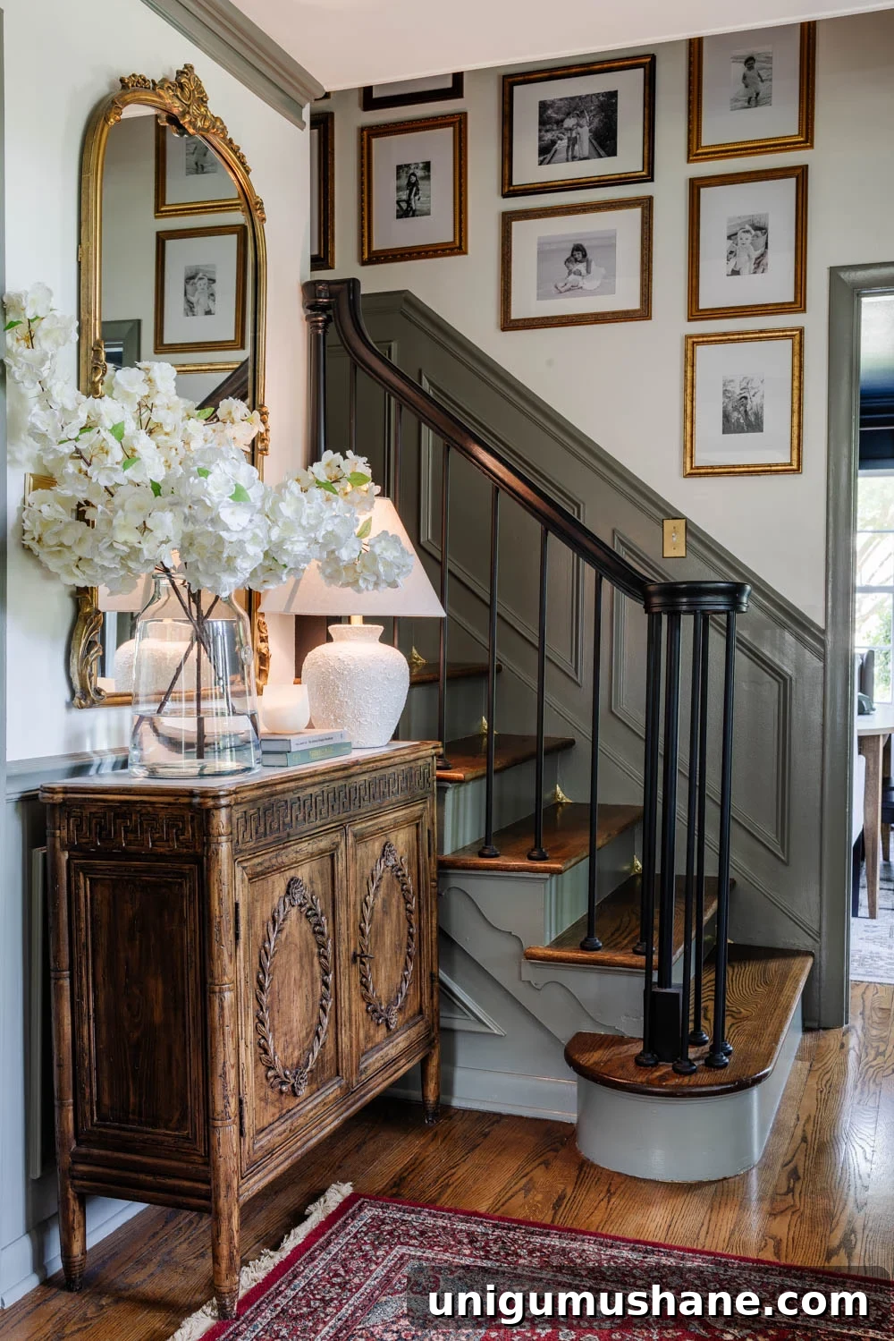 Add Dust Corners to Your Stairs for Cleaner, Safer Steps 2 foyer stairs with dust corners and gallery wall