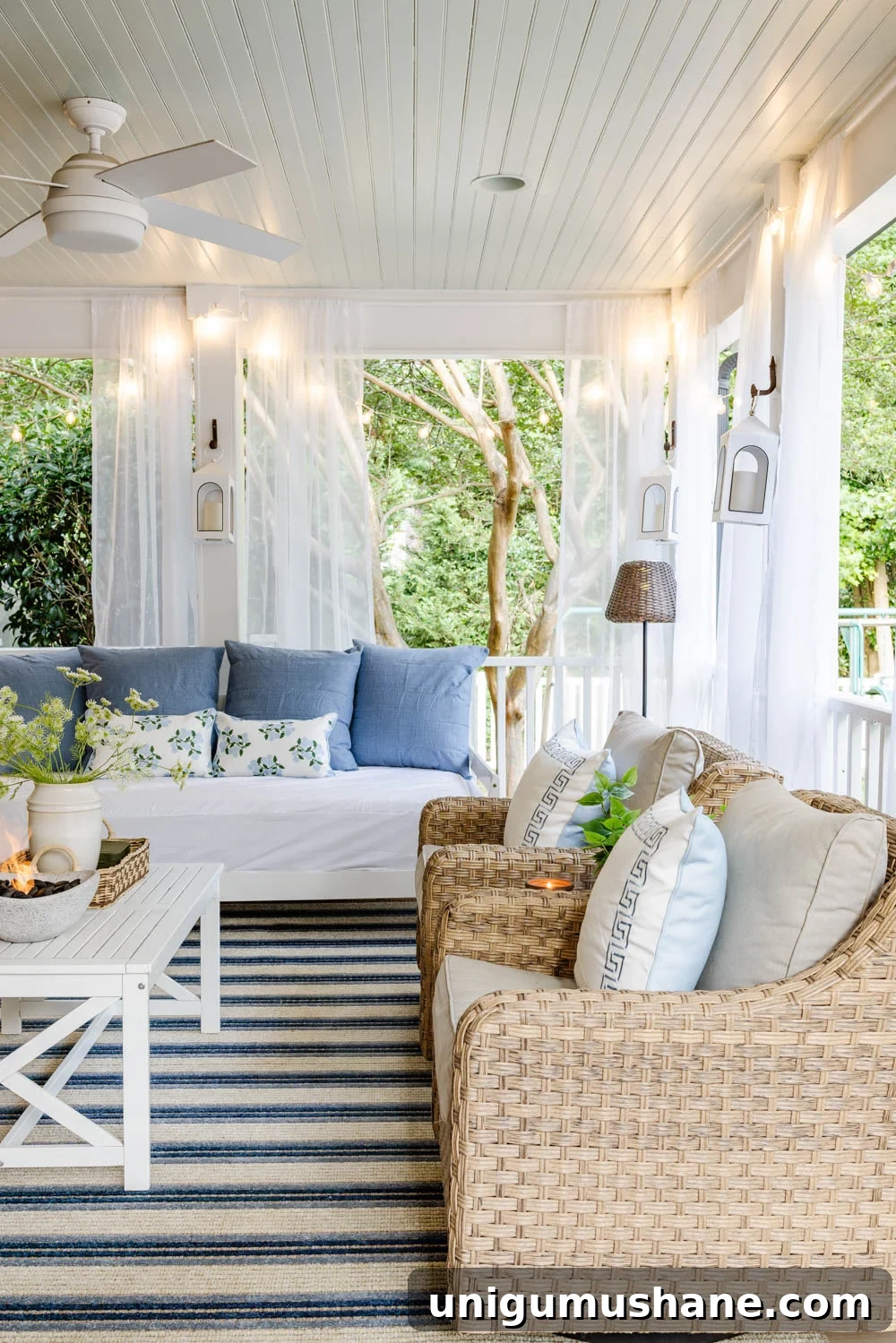 How We Turned Our Backyard into a DIY Outdoor Living Room 12 outdoor living room with fireplace on a back porch