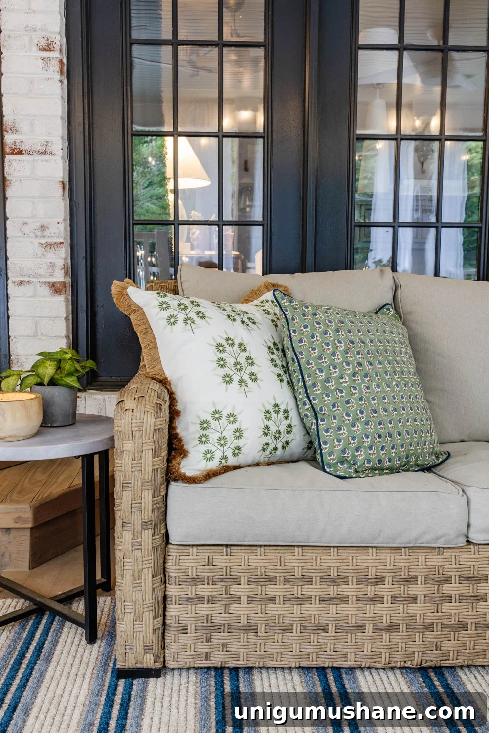 How We Turned Our Backyard into a DIY Outdoor Living Room 13 outdoor living room with fireplace on a back porch