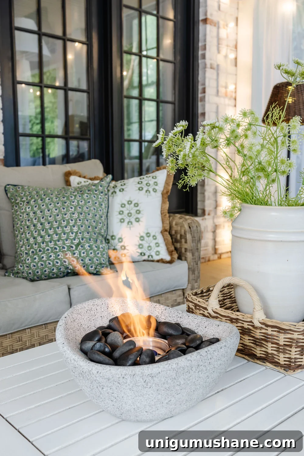How We Turned Our Backyard into a DIY Outdoor Living Room 14 outdoor living room with fireplace on a back porch