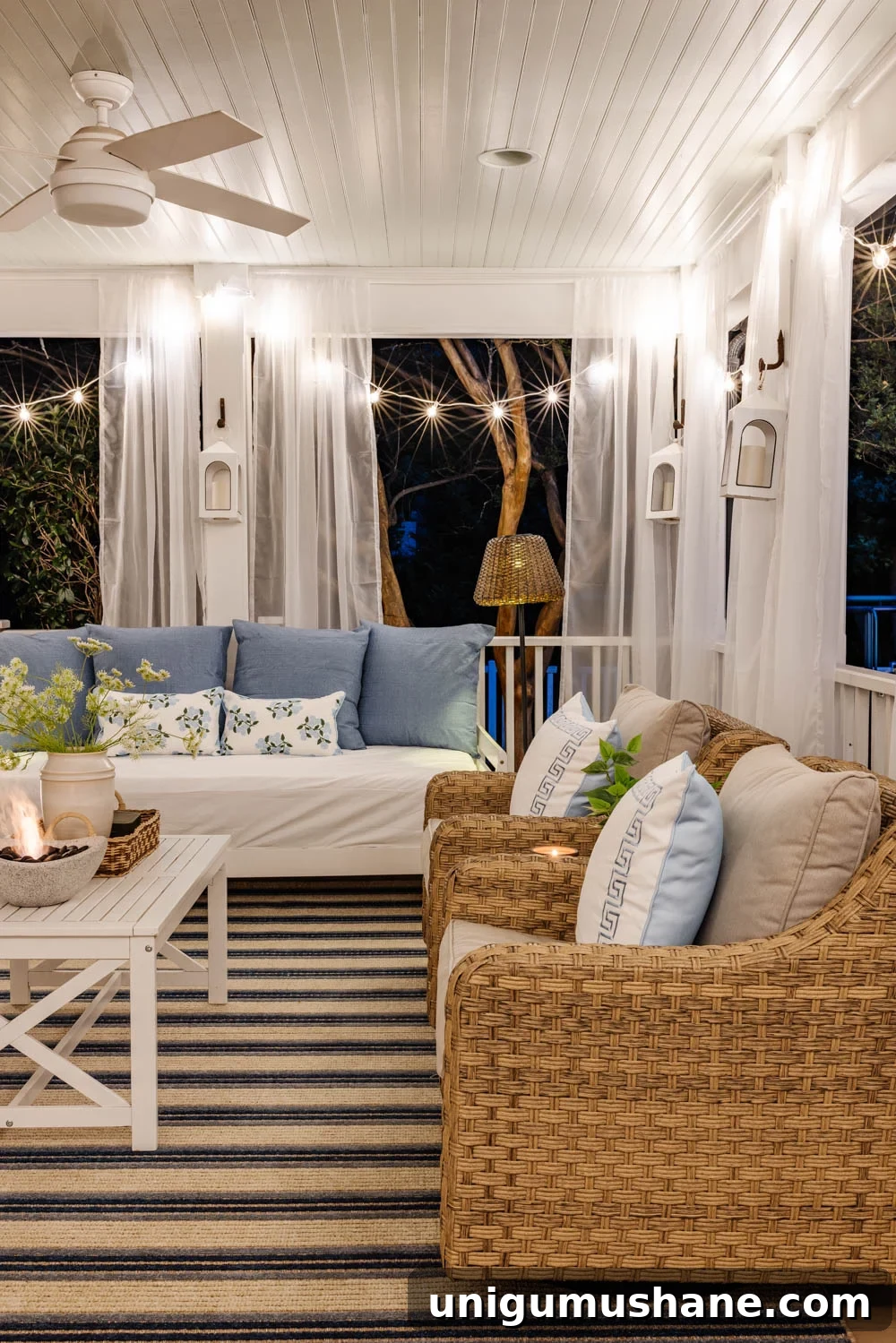 How We Turned Our Backyard into a DIY Outdoor Living Room 16 outdoor living room with fireplace on a back porch
