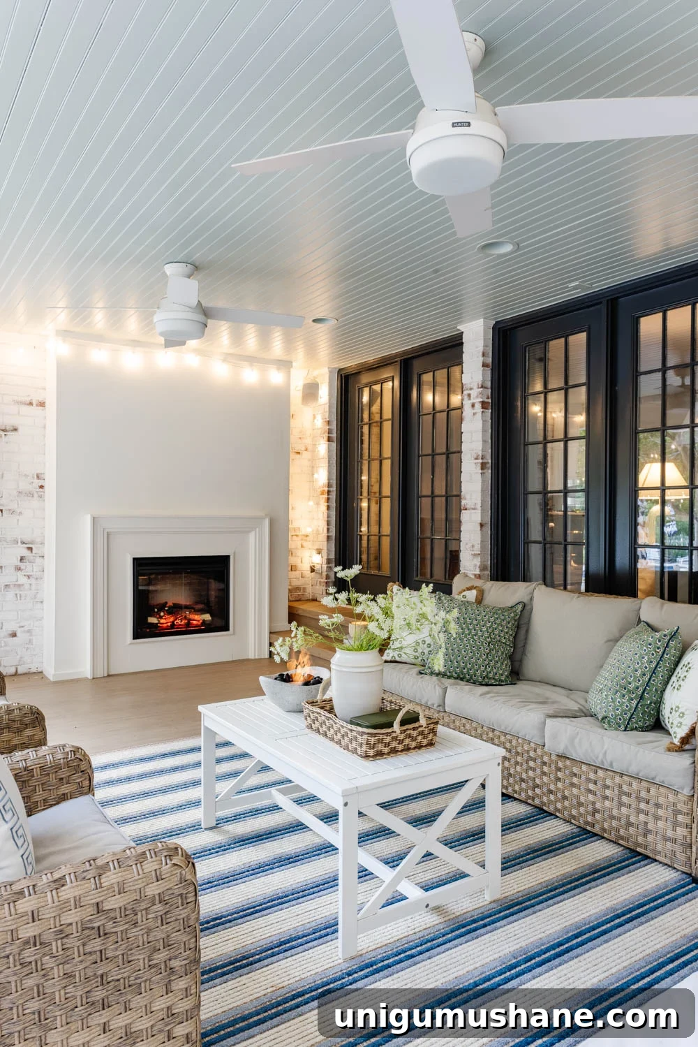 How We Turned Our Backyard into a DIY Outdoor Living Room 4 outdoor living room with fireplace on a back porch