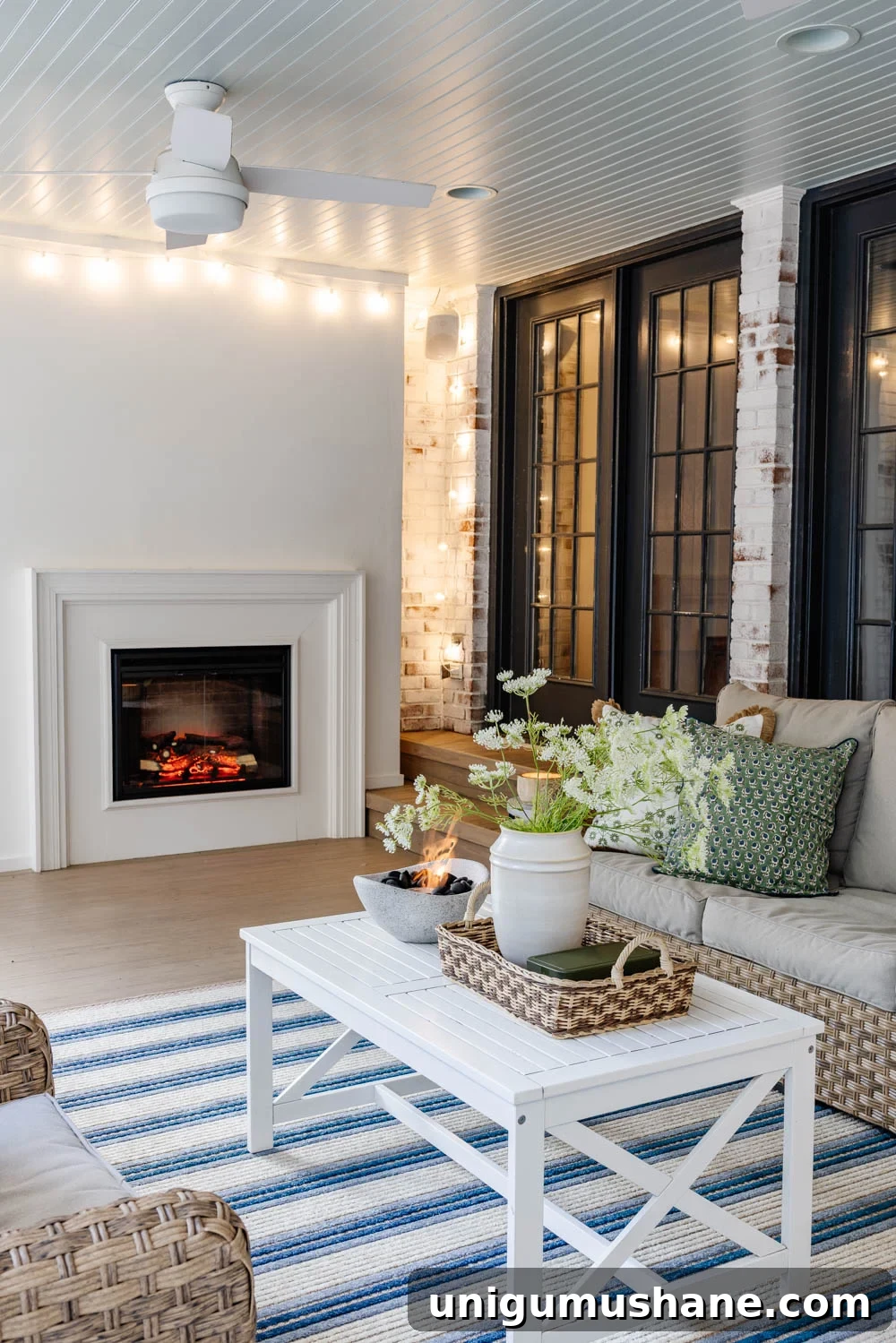 How We Turned Our Backyard into a DIY Outdoor Living Room 8 outdoor living room with fireplace on a back porch