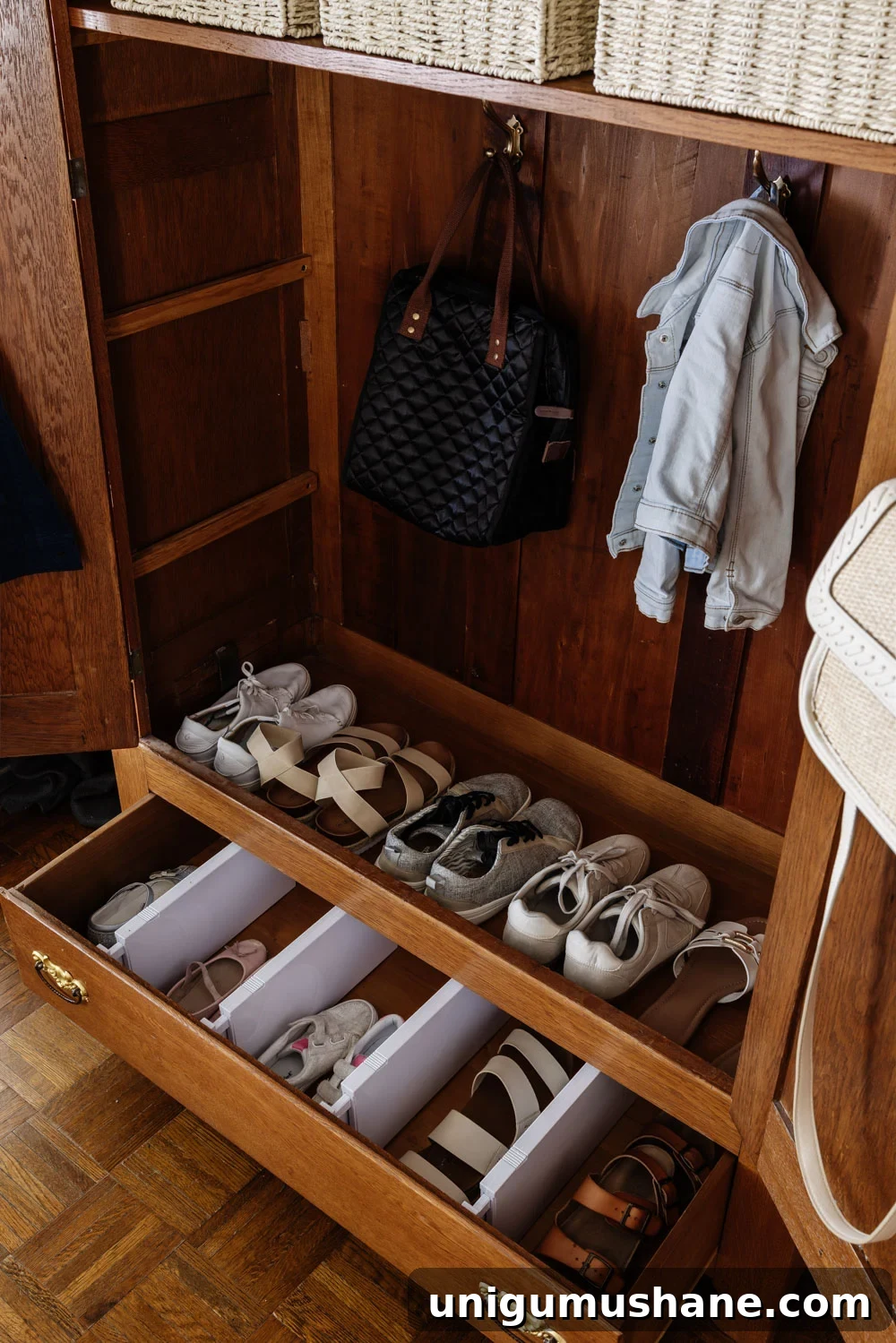 How We Added Entryway Storage Without a Mudroom 5 armoire coat closet in an entryway for storage without a mudroom