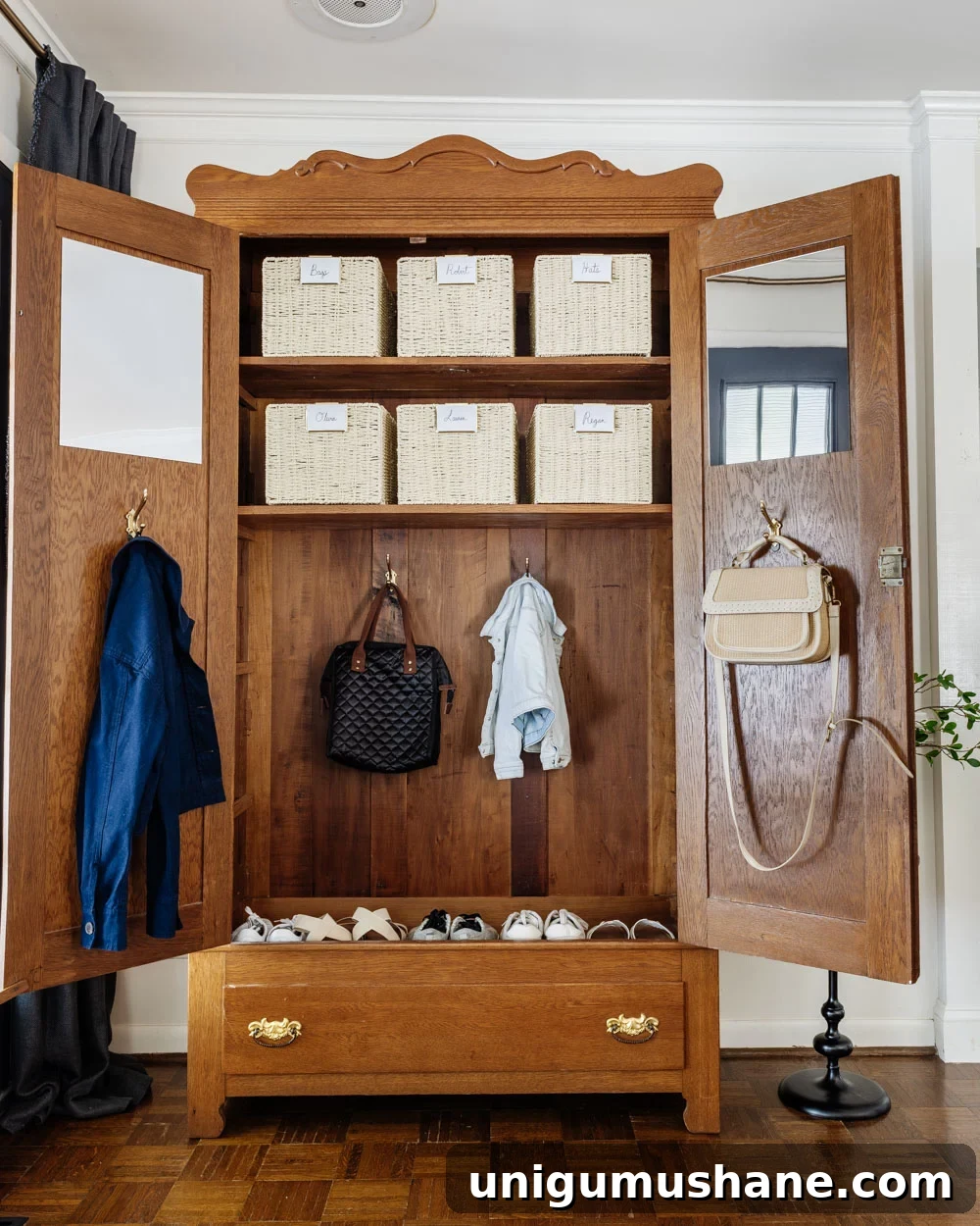 How We Added Entryway Storage Without a Mudroom 7 armoire coat closet in an entryway for storage without a mudroom